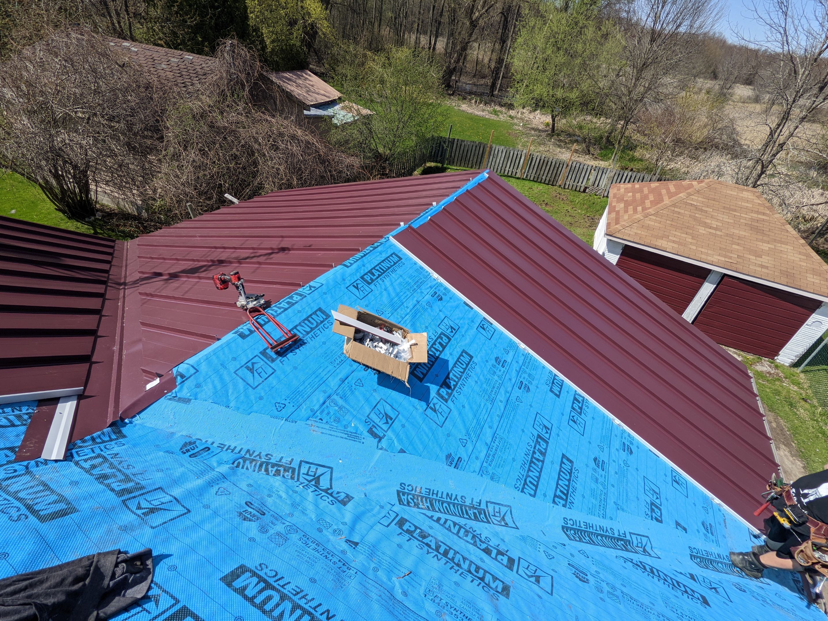 Residential Roofing Installation using 16" Standing Seam Panels by Jay Carter Roofing & Sheet Metal