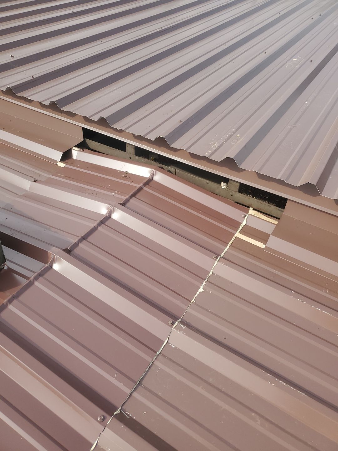 Commercial Roofing Installation using Metal by Rainstoppers Roofing