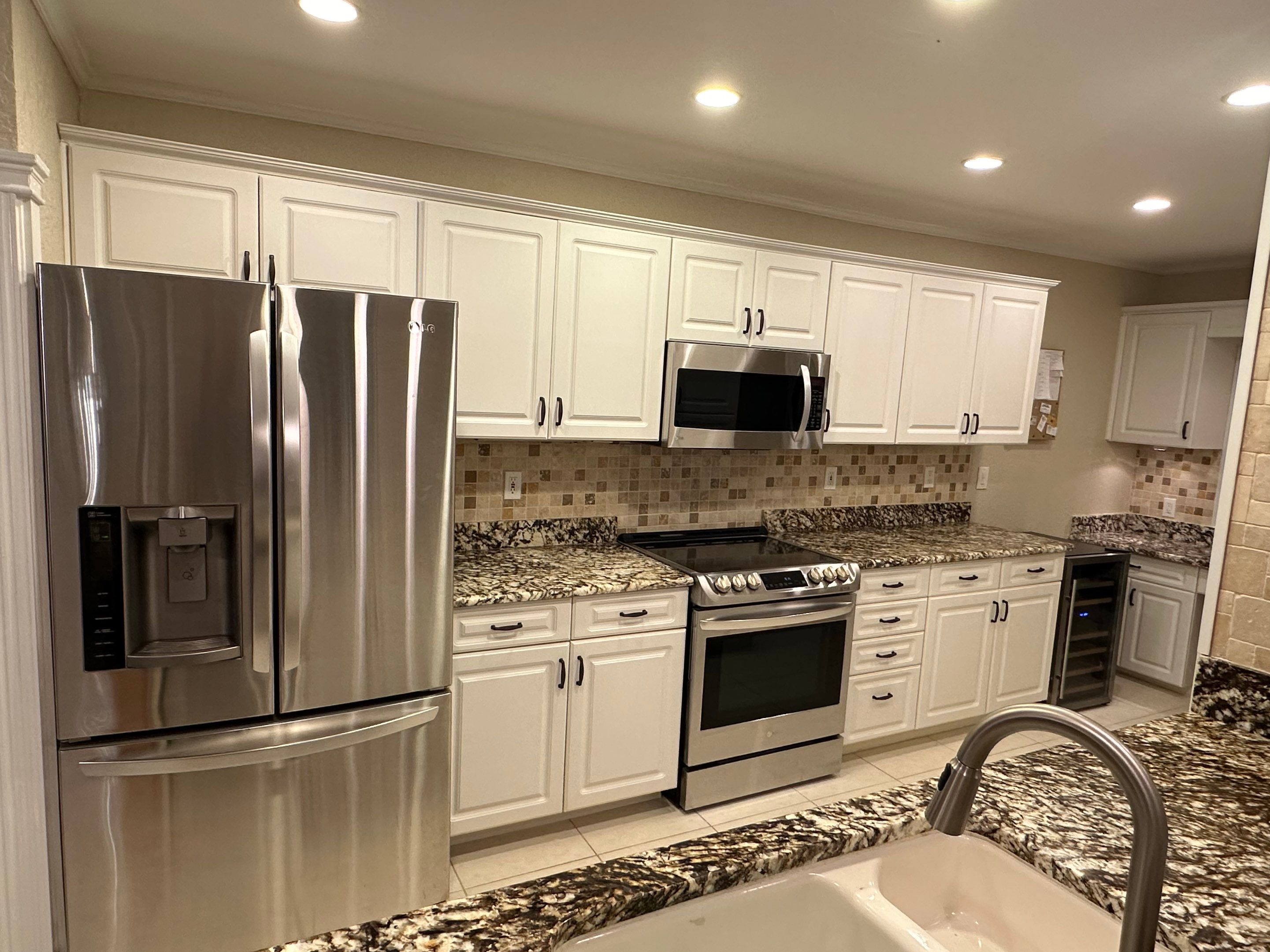 Mold remediation and rebuild of kitchen and living areas by Bay Coast Restoration 