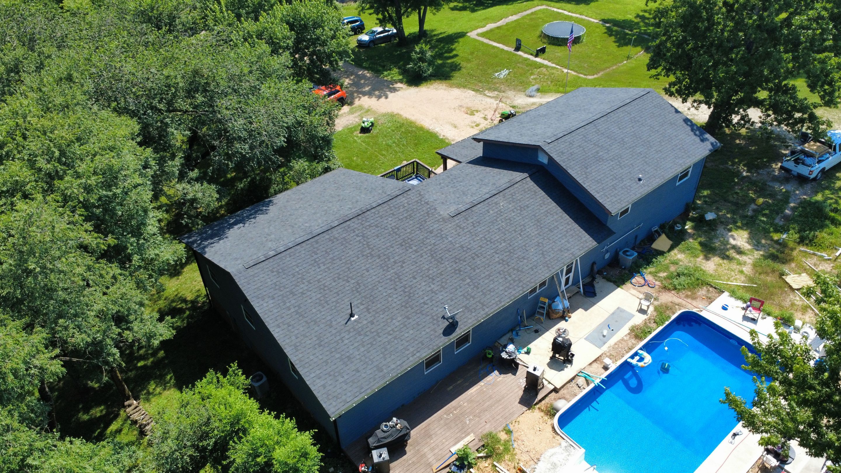 Residential Roof + Gutters & Downspouts Install  by Titan Commercial & Residential Roofing 