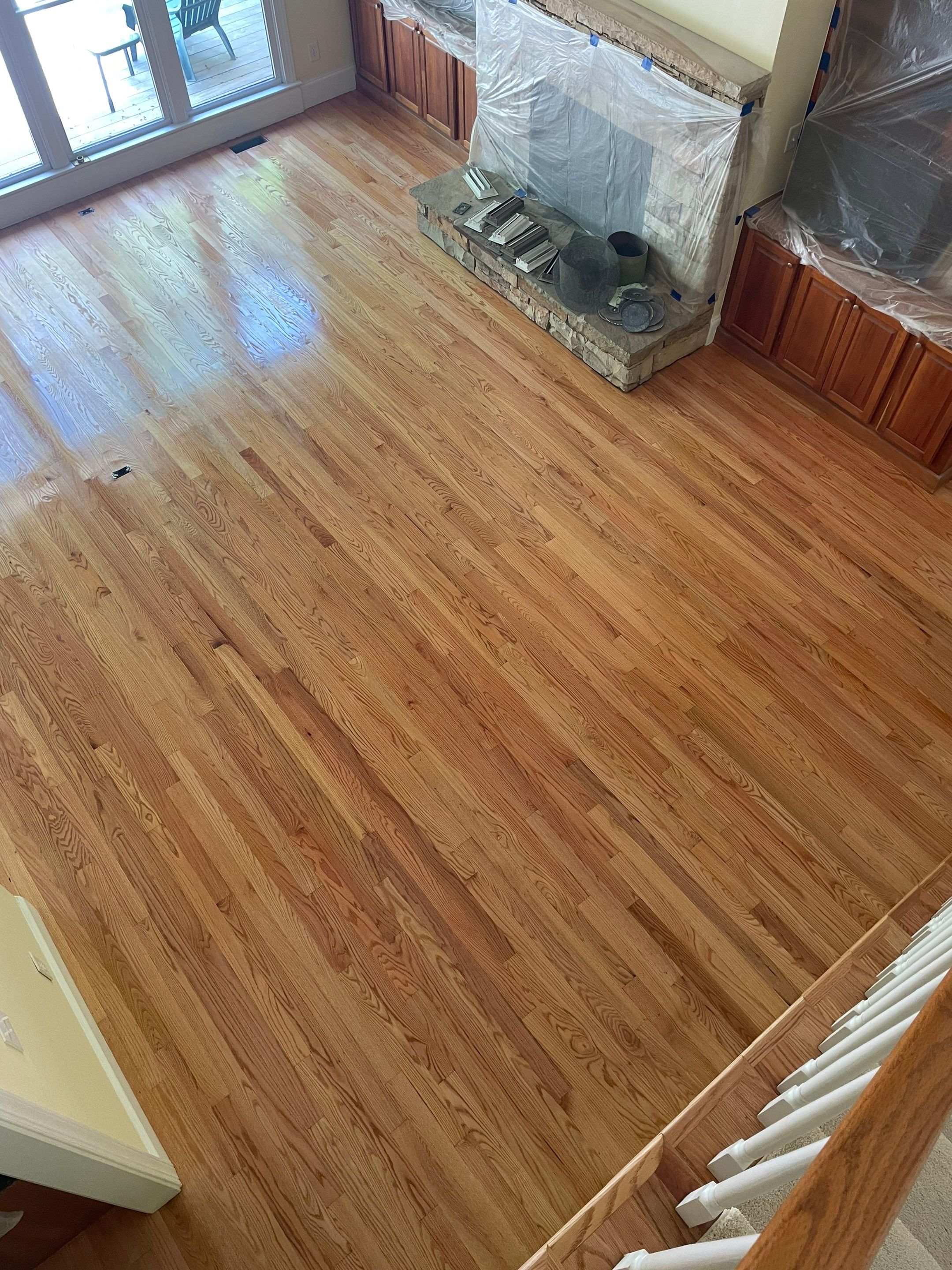 Added flooring, refinished all the floors by Accent Custom Floors