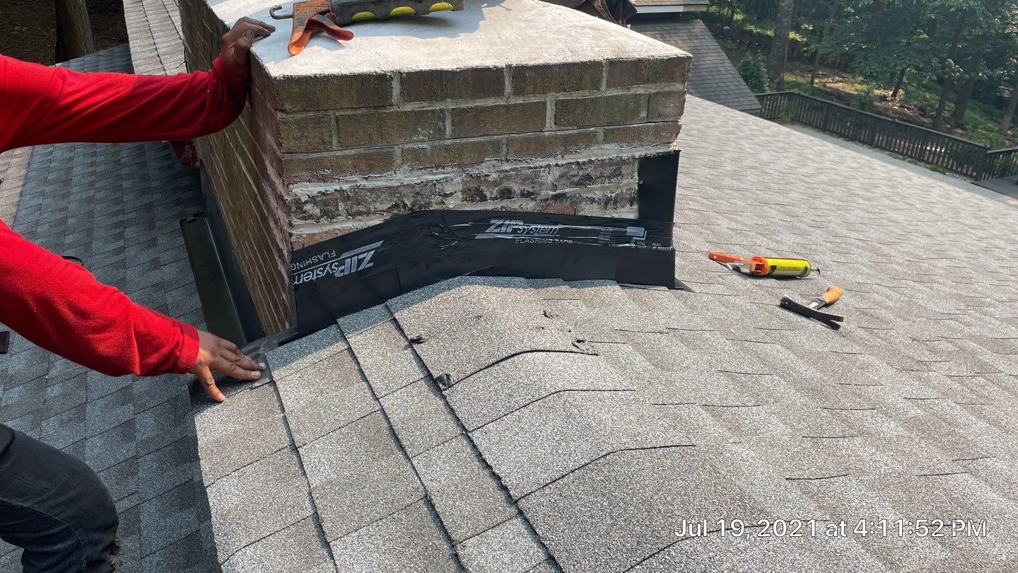 Deckhouse Roof Replacement by American Home Contractors