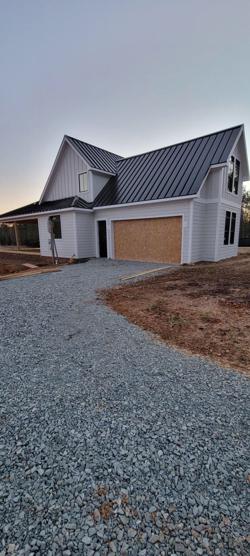 Custom Home Metal Roof Installation by Just In Time Roofing and Restoration