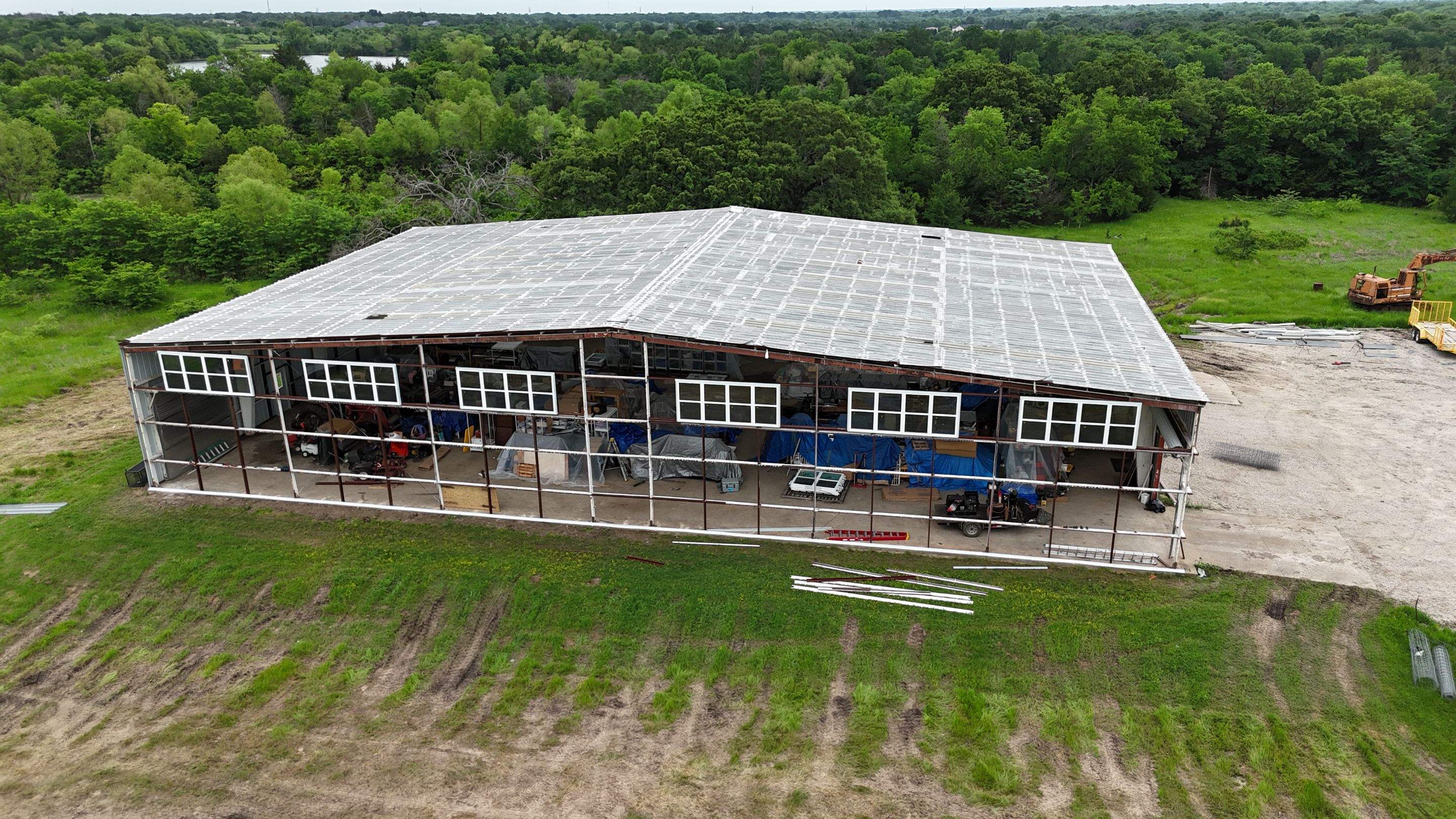 Complete Restoration with Skylight/Window Install - Greenville, TX by Hostetler Roofing
