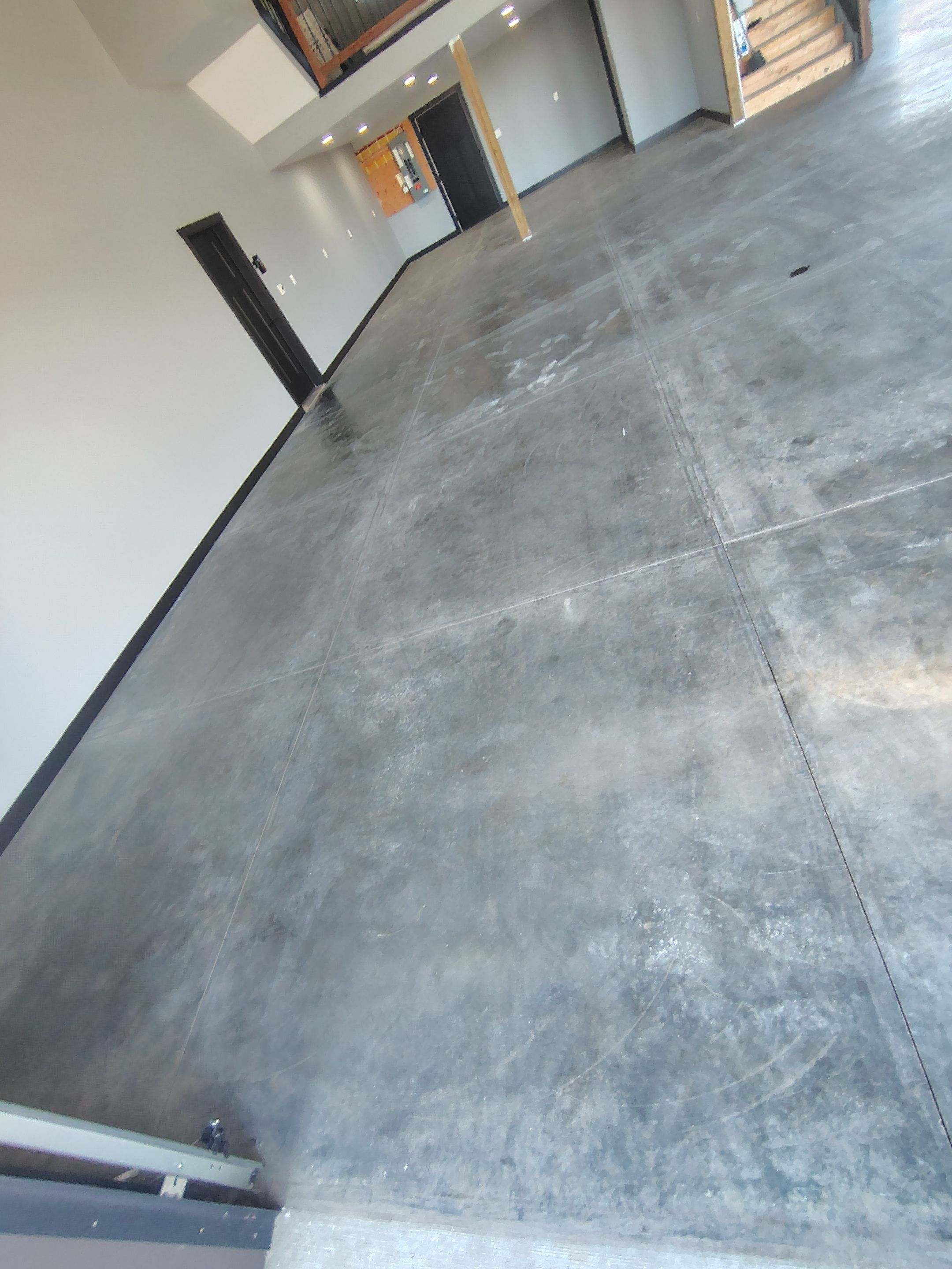 Polyaspartic Garage Floor Coating with Decorative Flake in Wentworth by Select Painting, Coatings & Garage Cabinets
