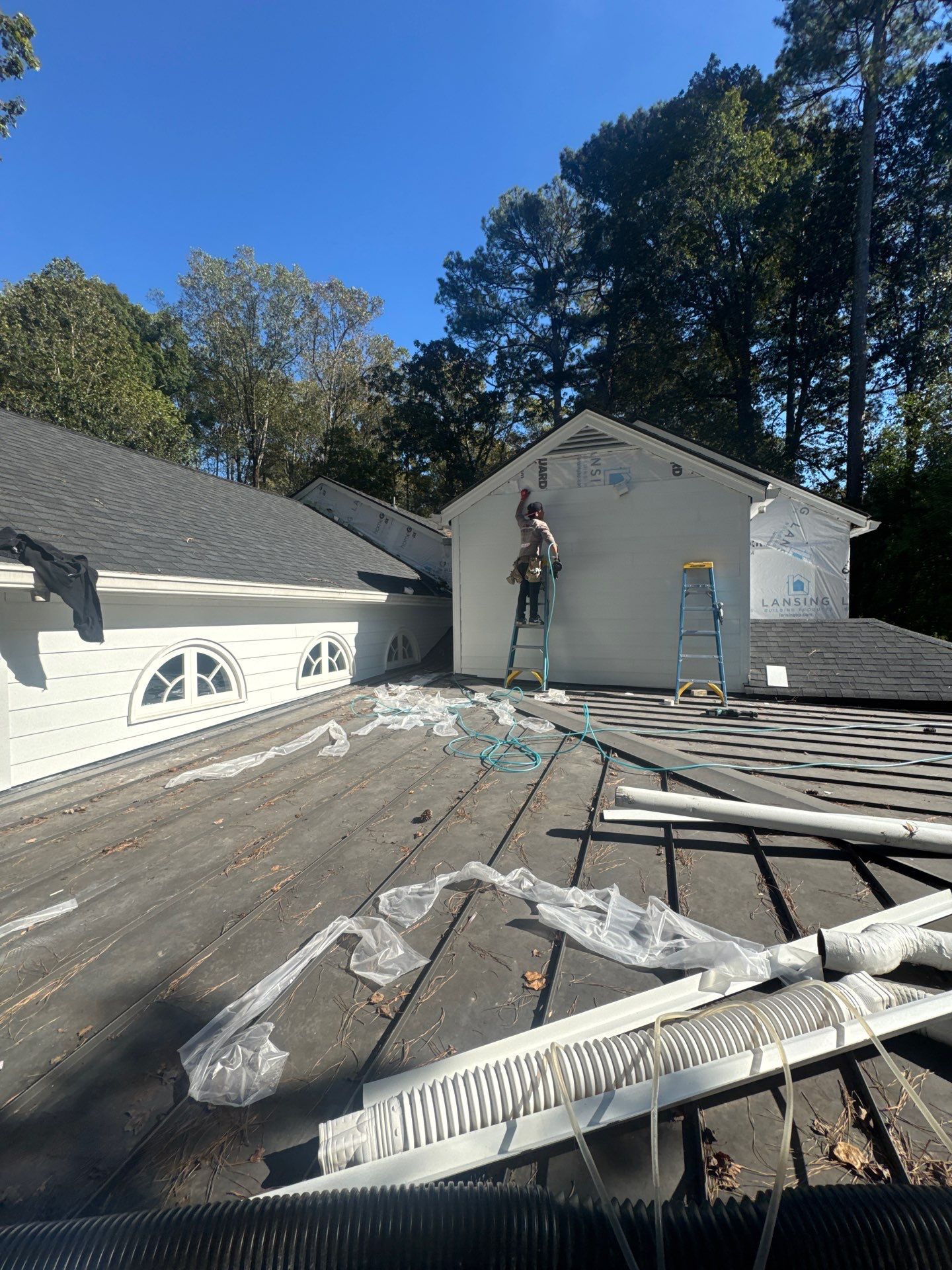 Siding Installation using James Hardie Color Plus Lap Siding by Nelson Exteriors