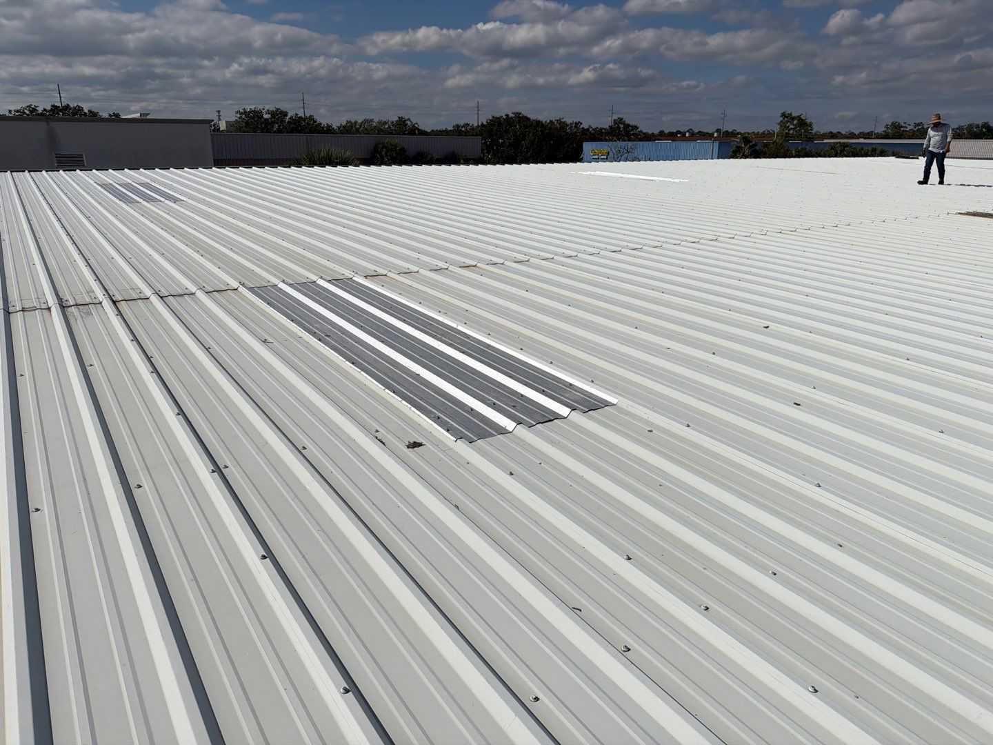 Orlando Commercial Metal Roof Restoration and Silicone Coating System by CES Roofing