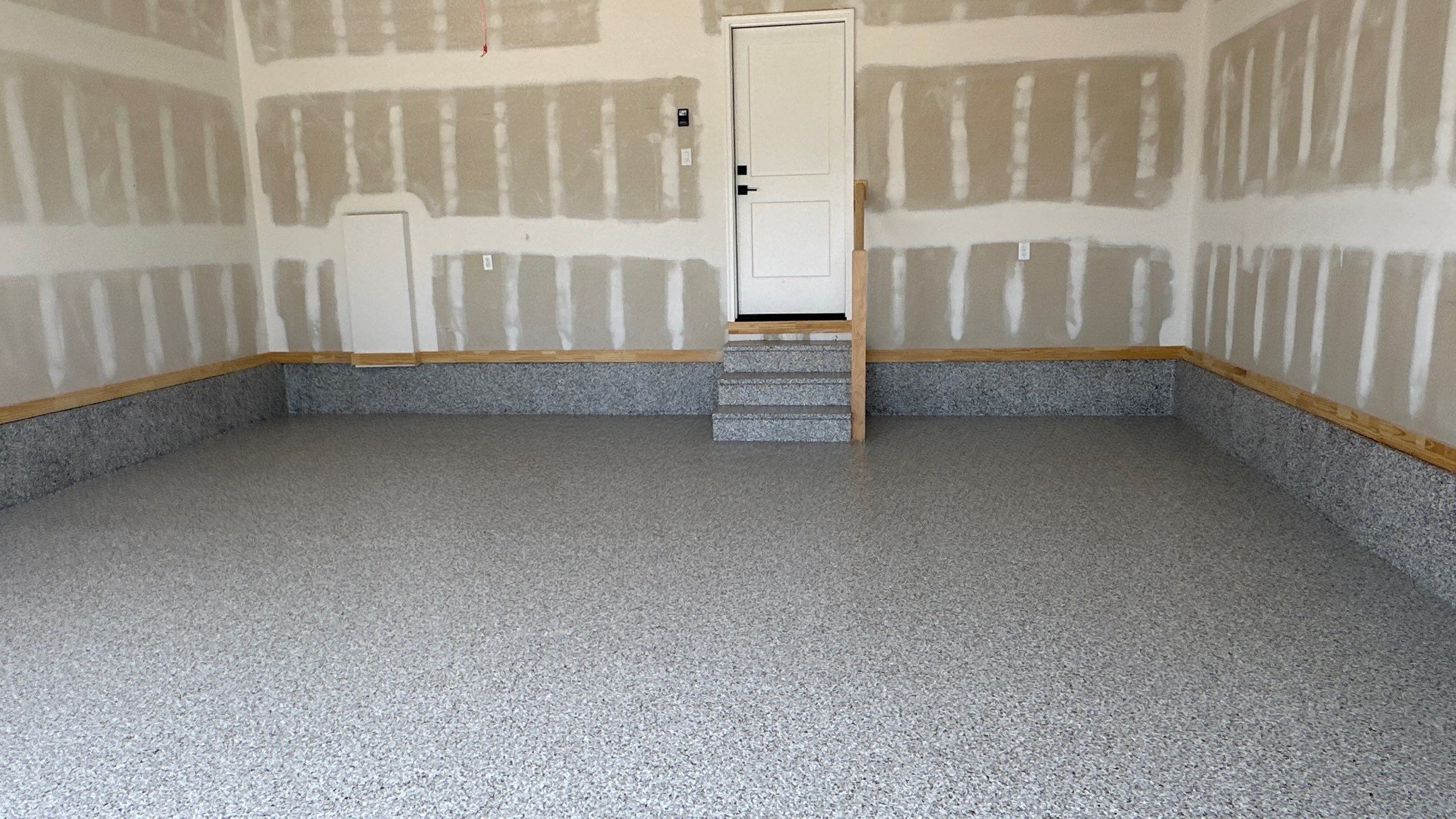 Phil B. new floor with Coyote flake by Banner Garage