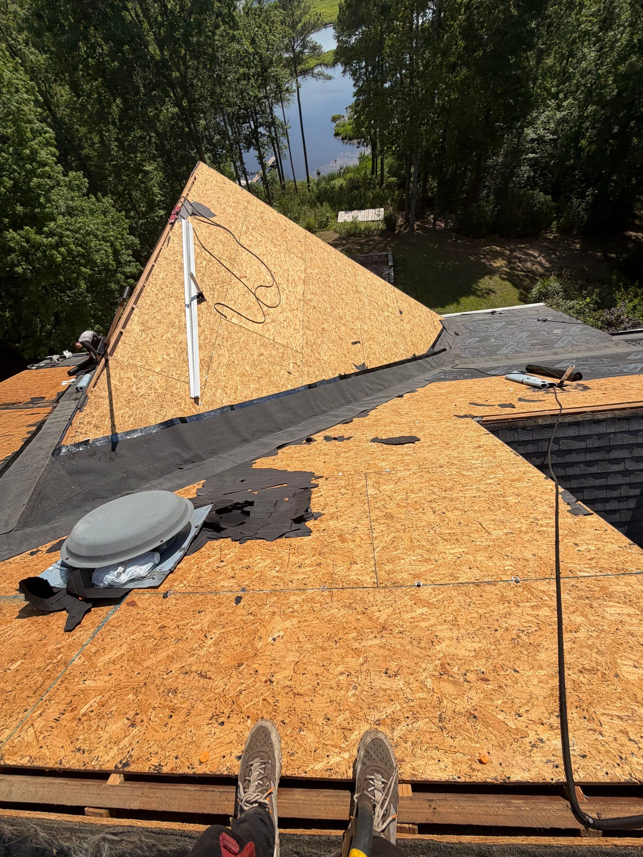 Lancaster Roof Replacement Featuring Architectural Shingles and Attic Insulation by Cade Construction