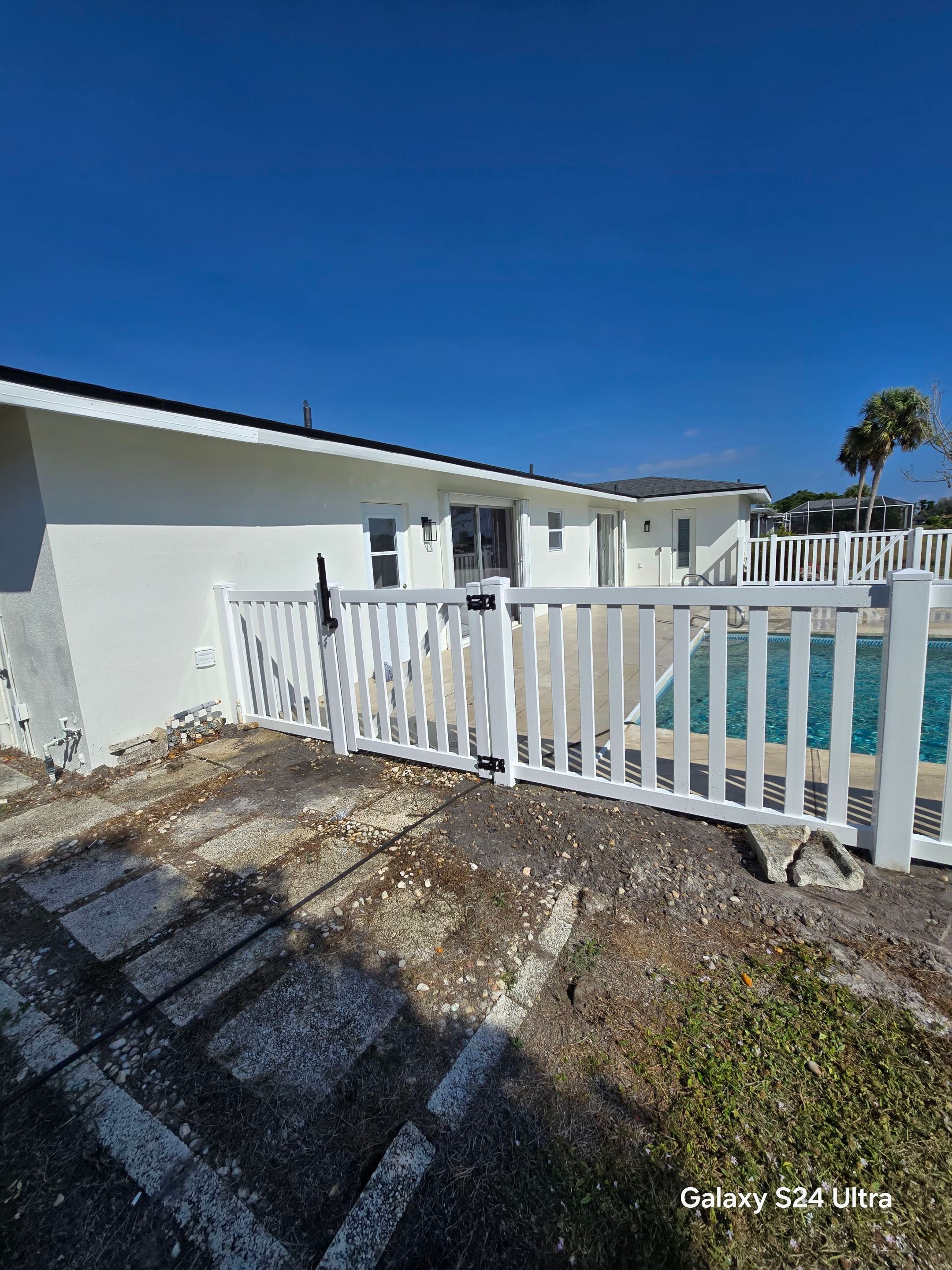 Vinyl Picket Fence for Pool in Port Charlotte by True Fence LLC