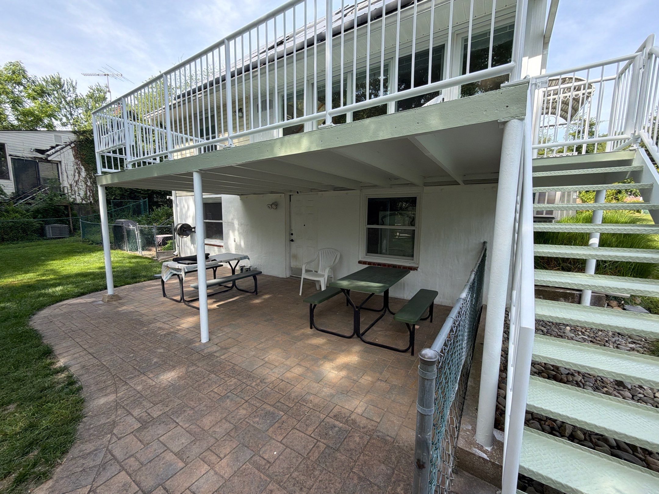 White Powder-Coated Outdoor Railings in Rockville & Staircase and Deck Refurbishment  by Capitol Iron Works