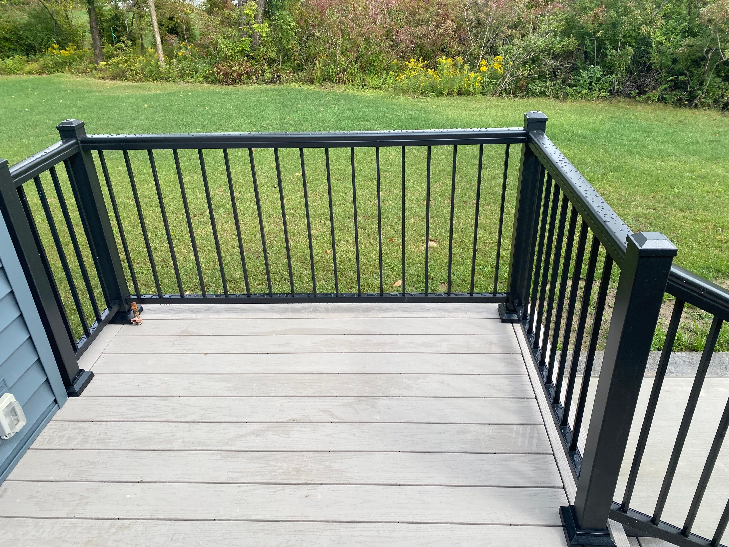 Outdoor Living- Deck and Concrete by Ivy Lea Construction