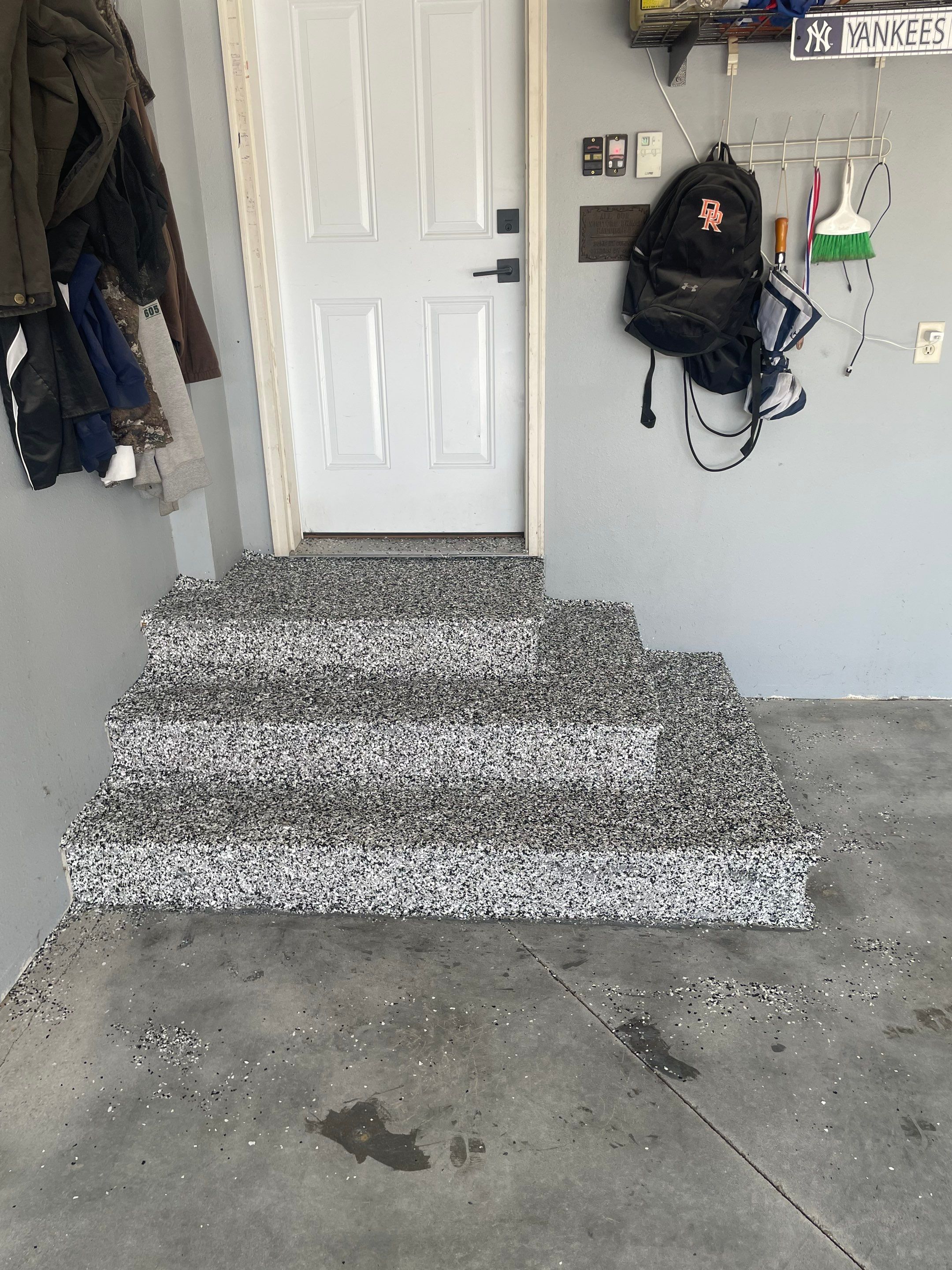 Full Garage Floor Epoxy Coating Installation in Dell Rapids by Select Painting, Coatings & Garage Cabinets