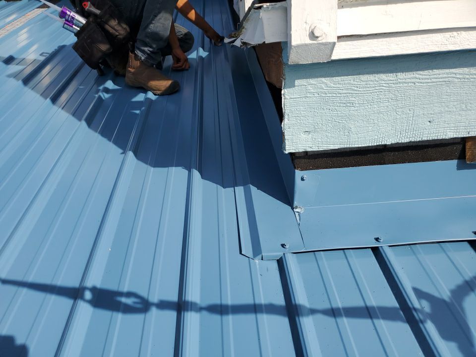 Commercial Roofing Installation using Metal roofing by American Roofing & Construction LLC