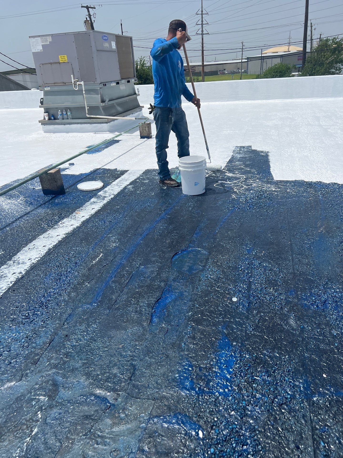 Dirty leaking Gravel Roof by Bayfront Roofing and Construction