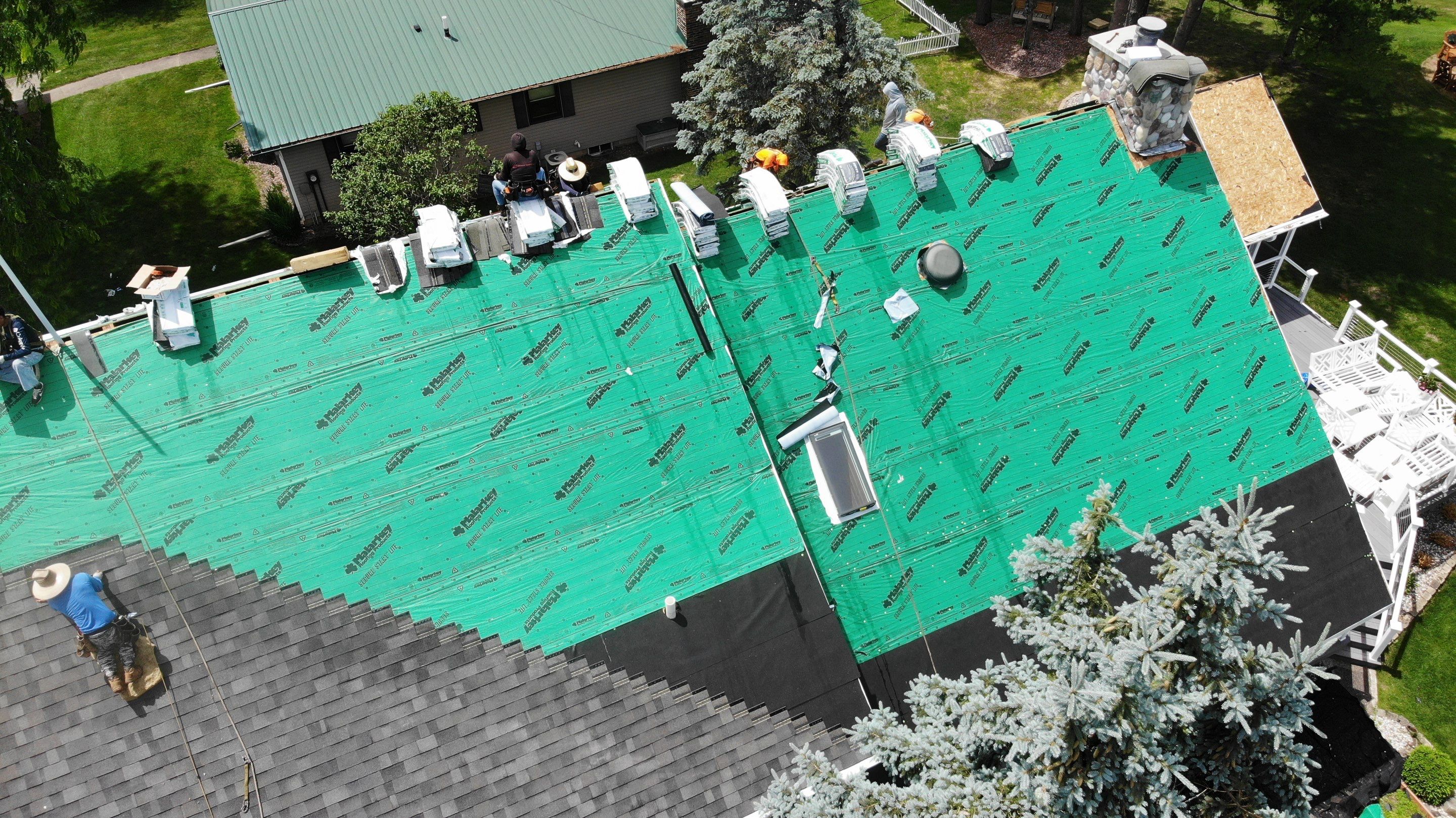 Nekoosa Residential Roof Replacement with Architectural Shingles and Skylights by Mr Roof & Remodeling Co