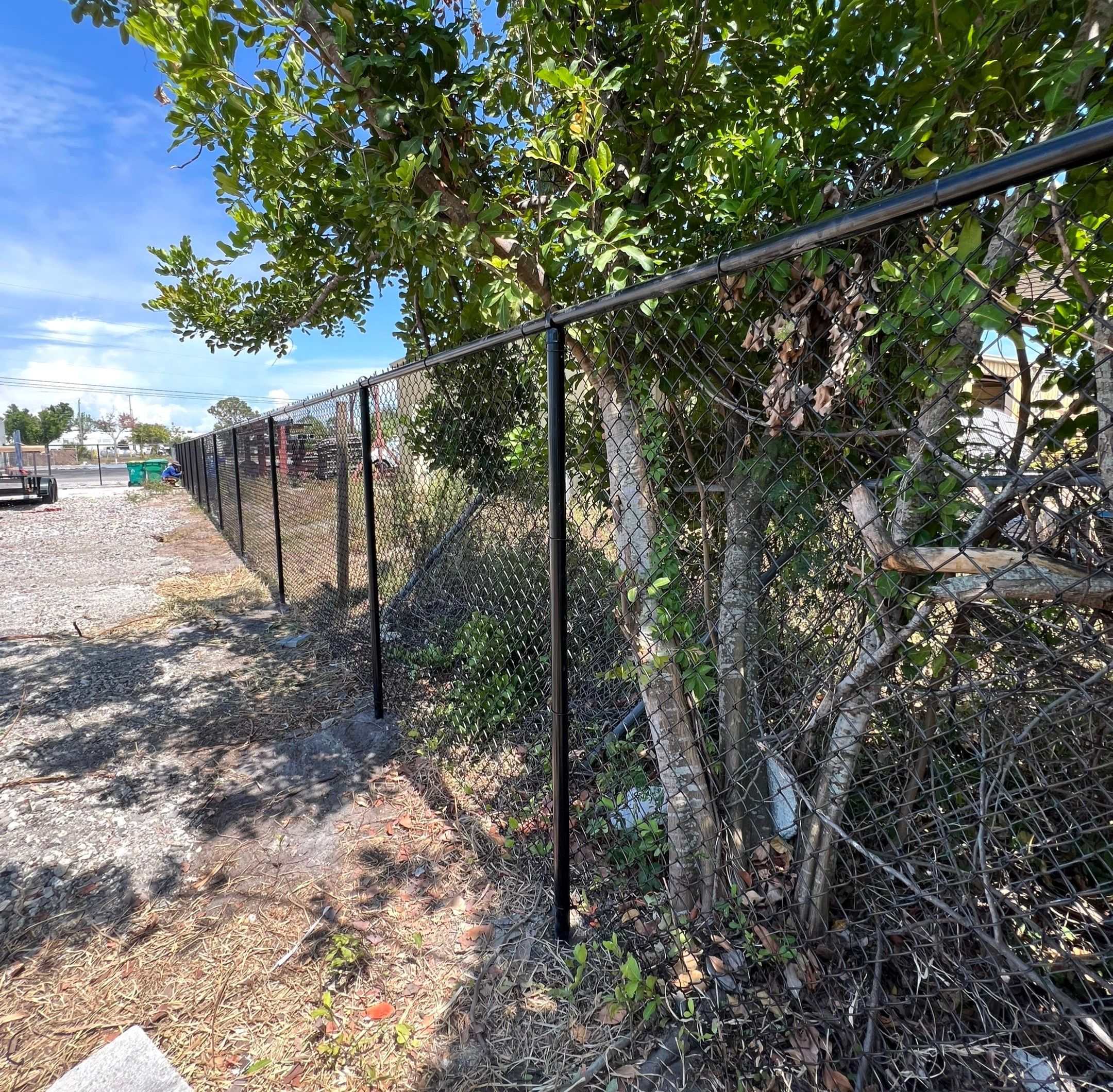 Chain-link Fence Installation using 6ft Black Chain Link Fence  by Asap fence and gates, LLC