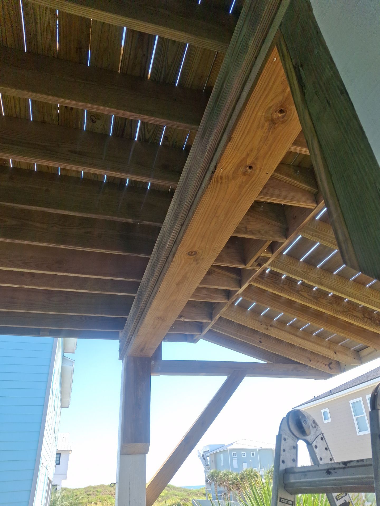 Roof Top Clubhouse on the Beach by Bayfront Roofing and Construction