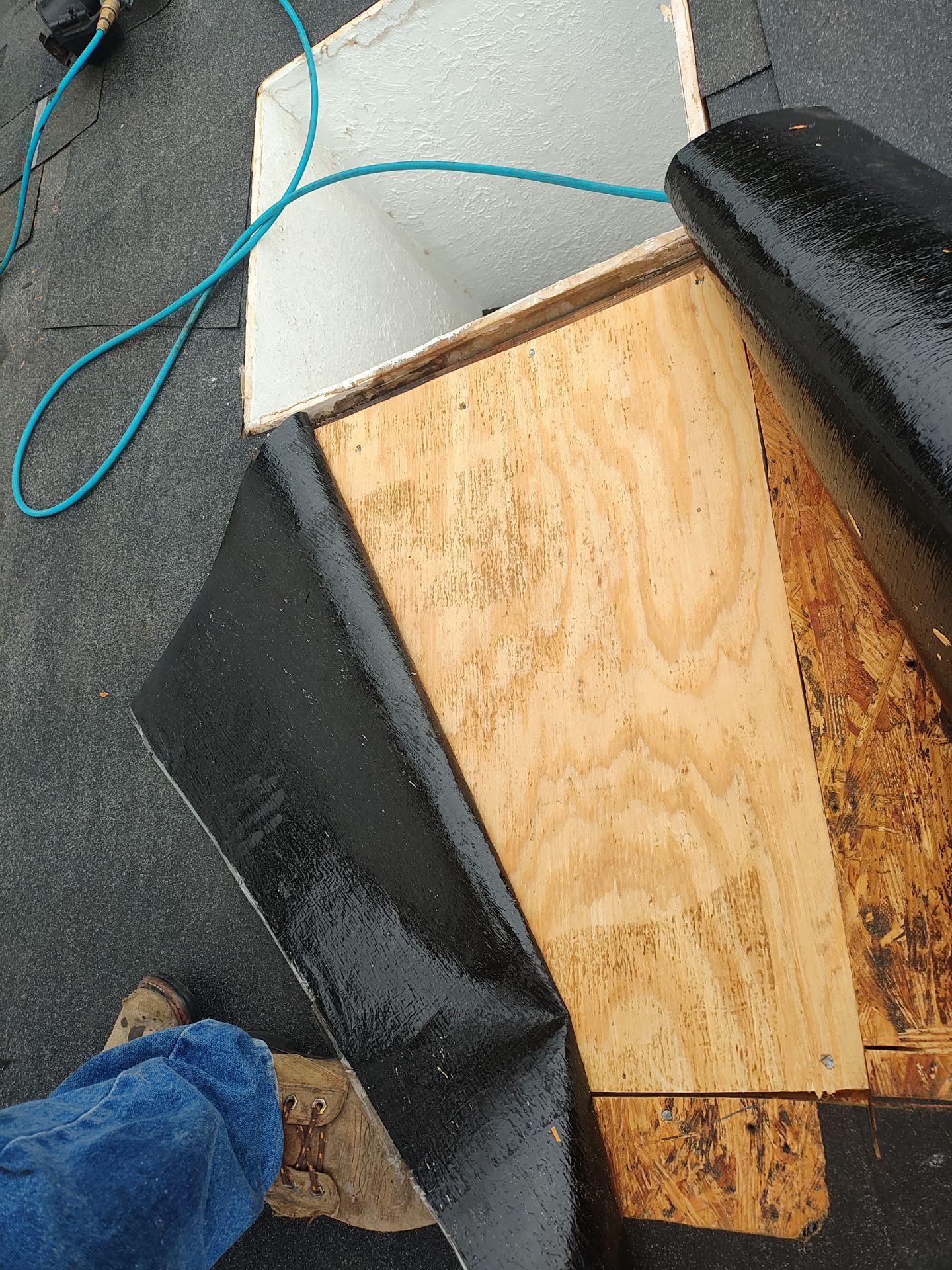 Nothing looks nicer than a little black roof by Bayfront Roofing and Construction