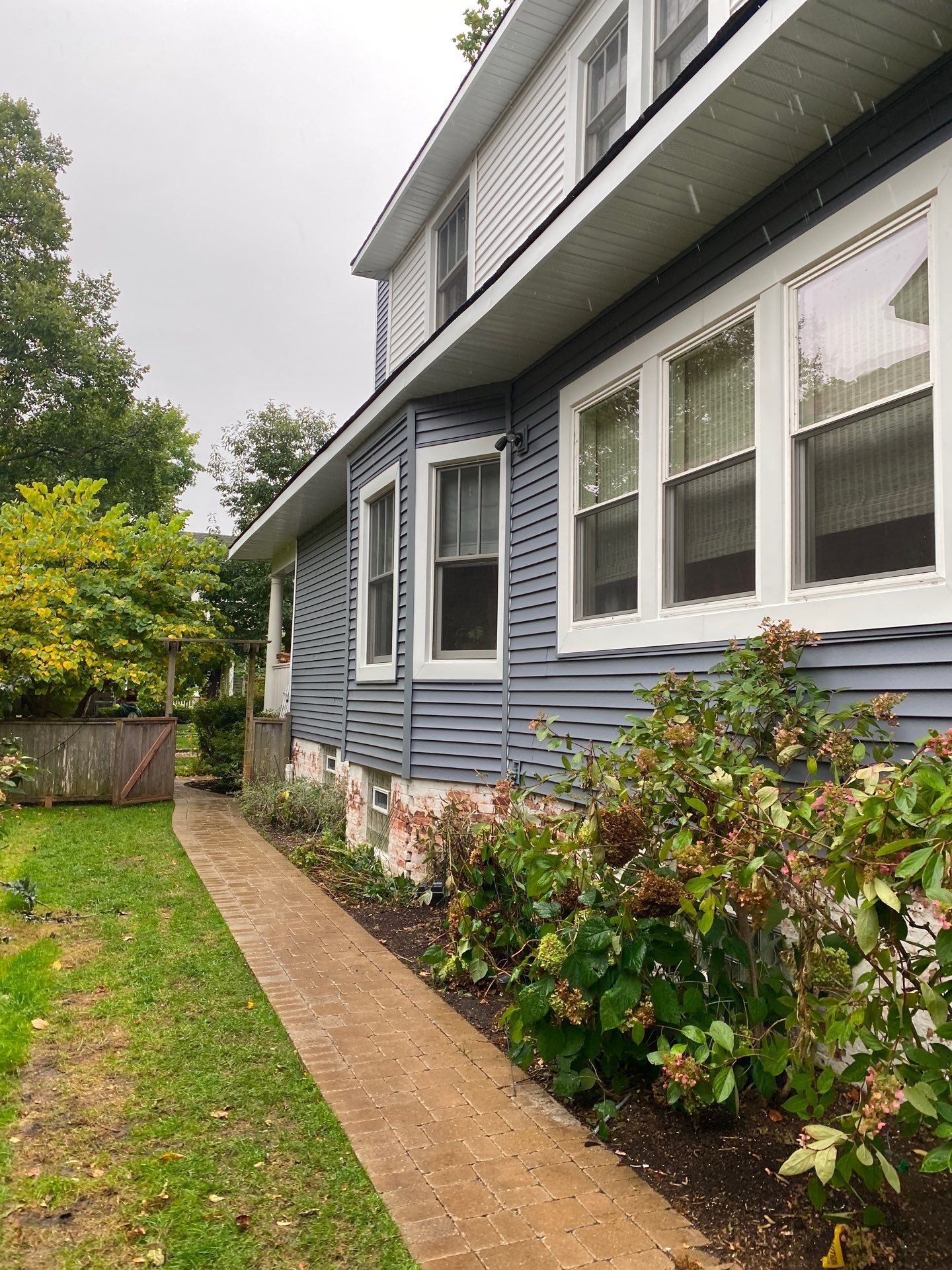 Asphalt Roof, Vinyl Siding, and Aluminum Gutter Replacement by Custom Installations