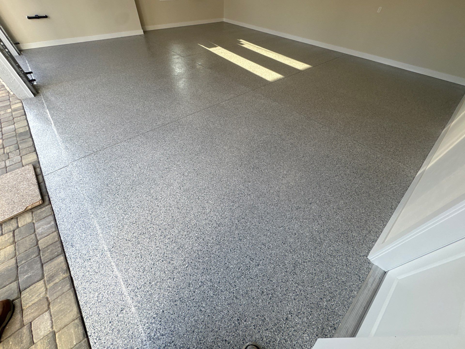 Garage in Tidal Wave by Cross Creek Concrete Coatings