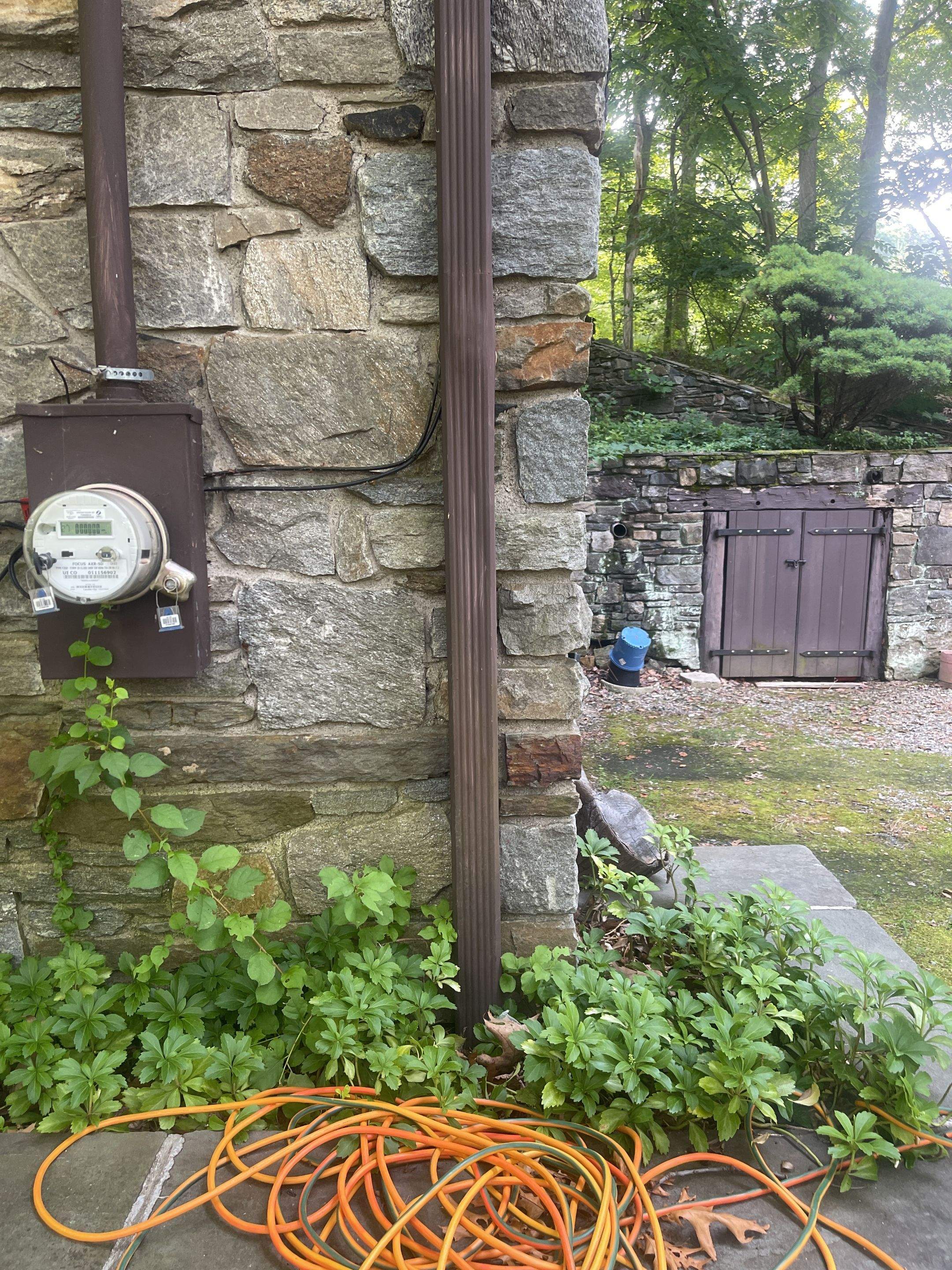 Gutter Installation using 5k Brown Gutters by A Plus Exterior