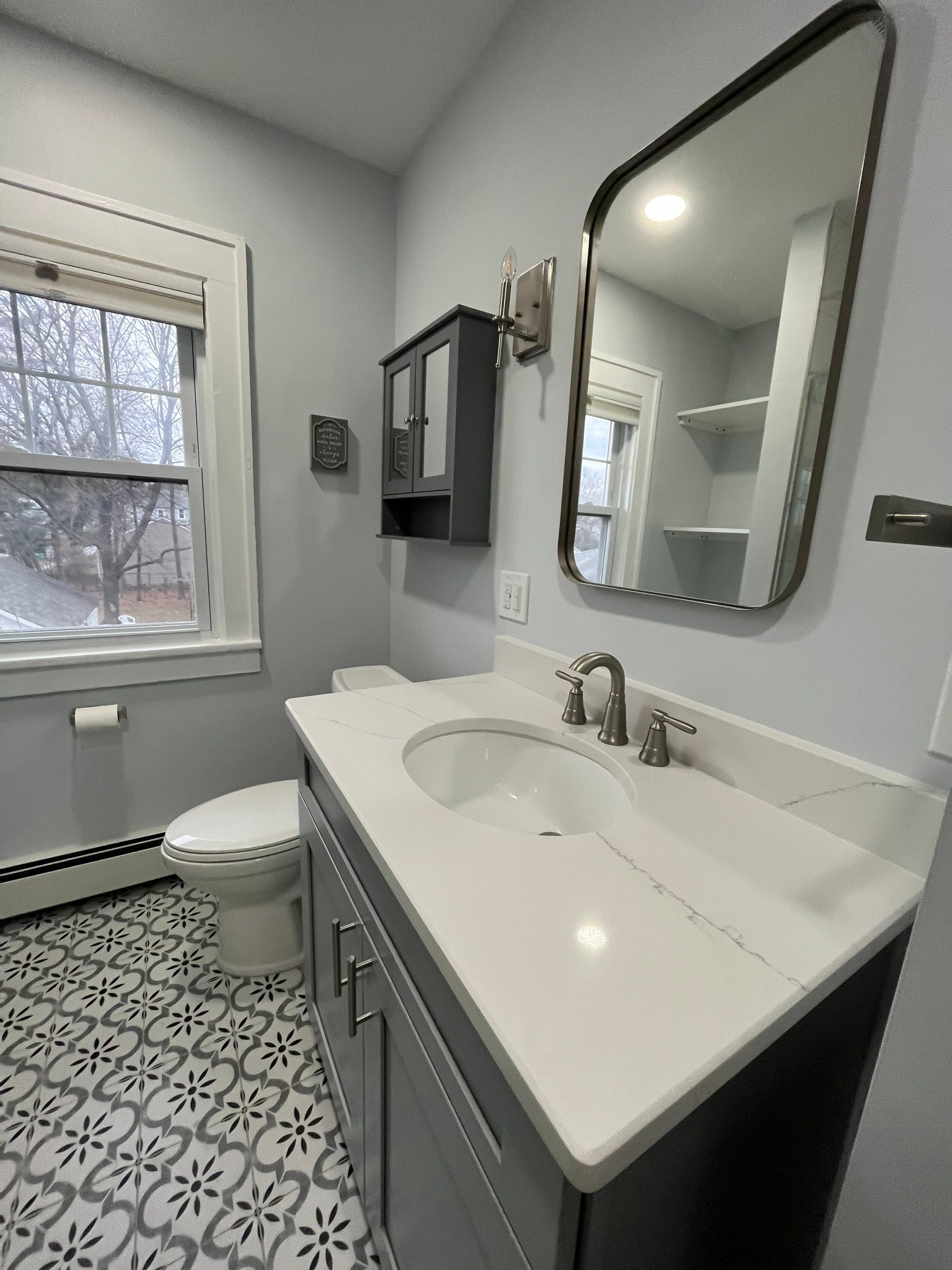 Bathroom Remodel using Tile by Home Concepts Construction