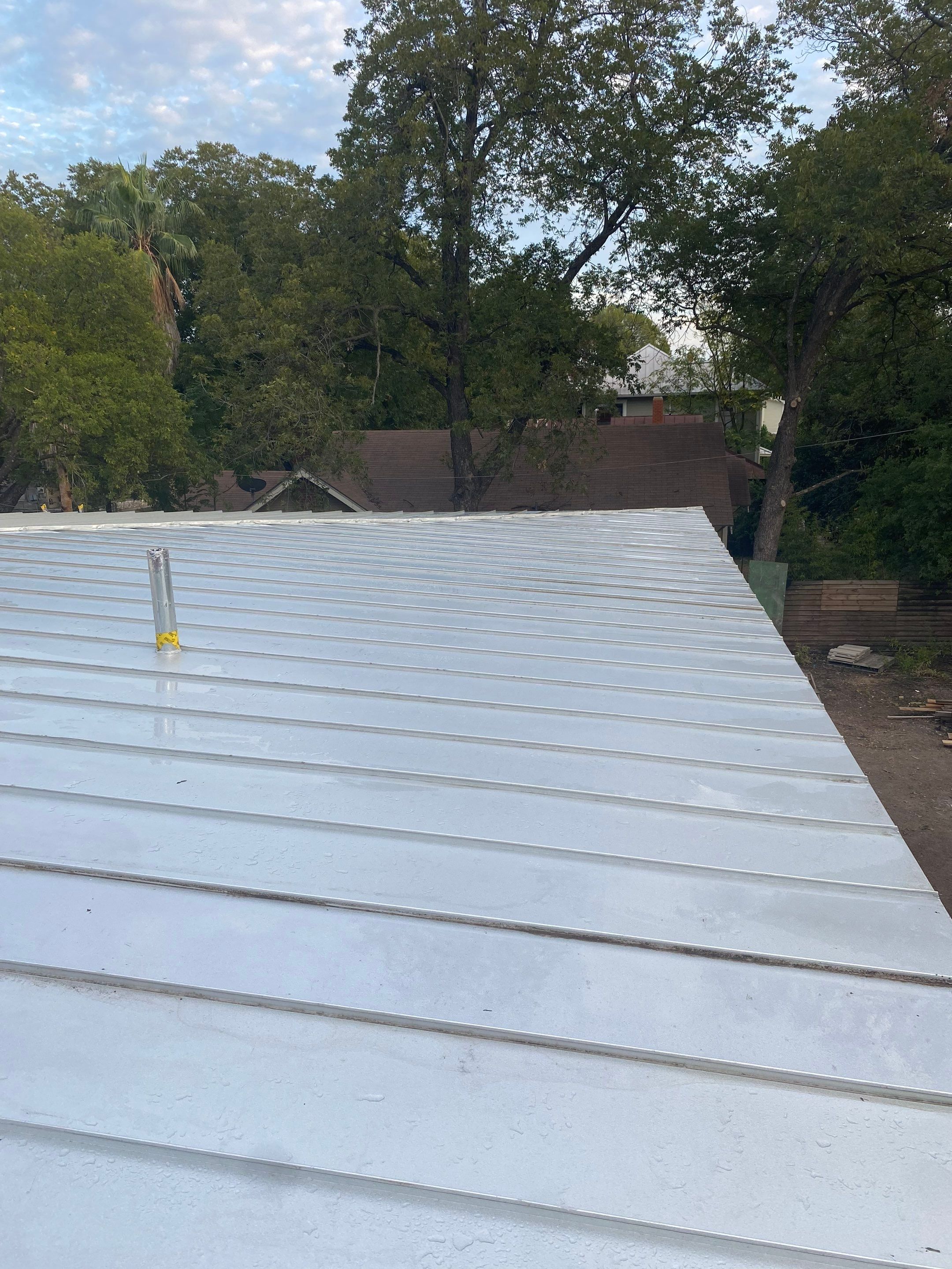 Residential Metal Roof Installation using McElroy Metal by Premier Roofing and Contracting