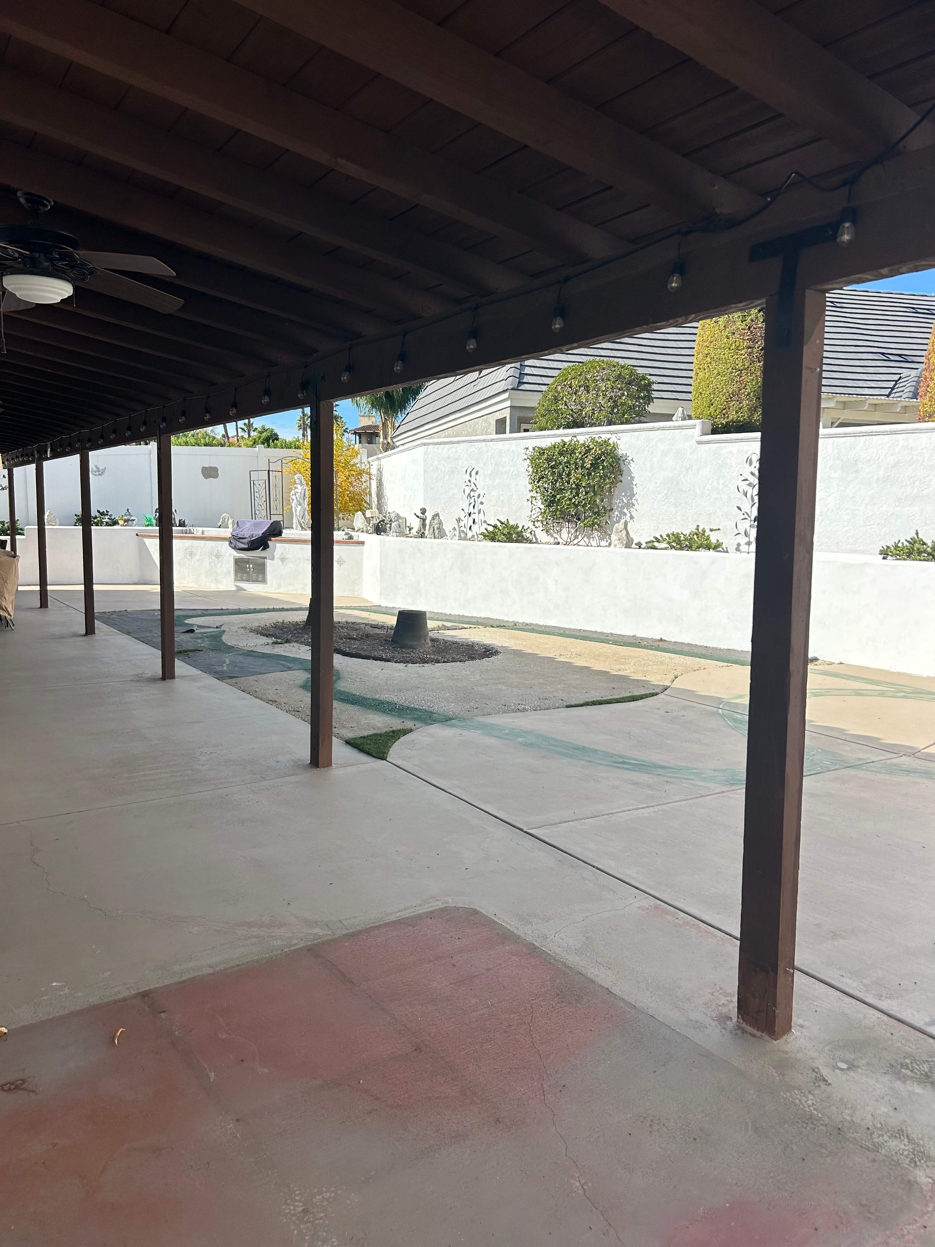 Pool and spa freeform travertine coping by Premier Pools and Spas Temecula
