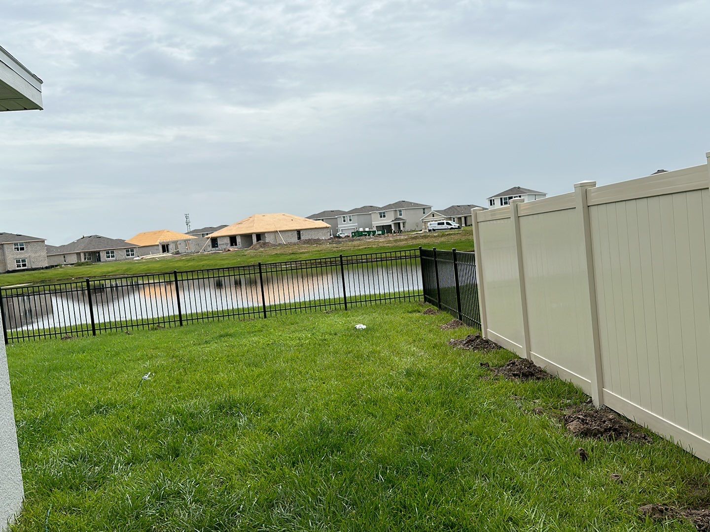 Vinyl Fence Installation using Vinyl and Black 3 Rail Aluminum Fence by Asap fence and gates, LLC
