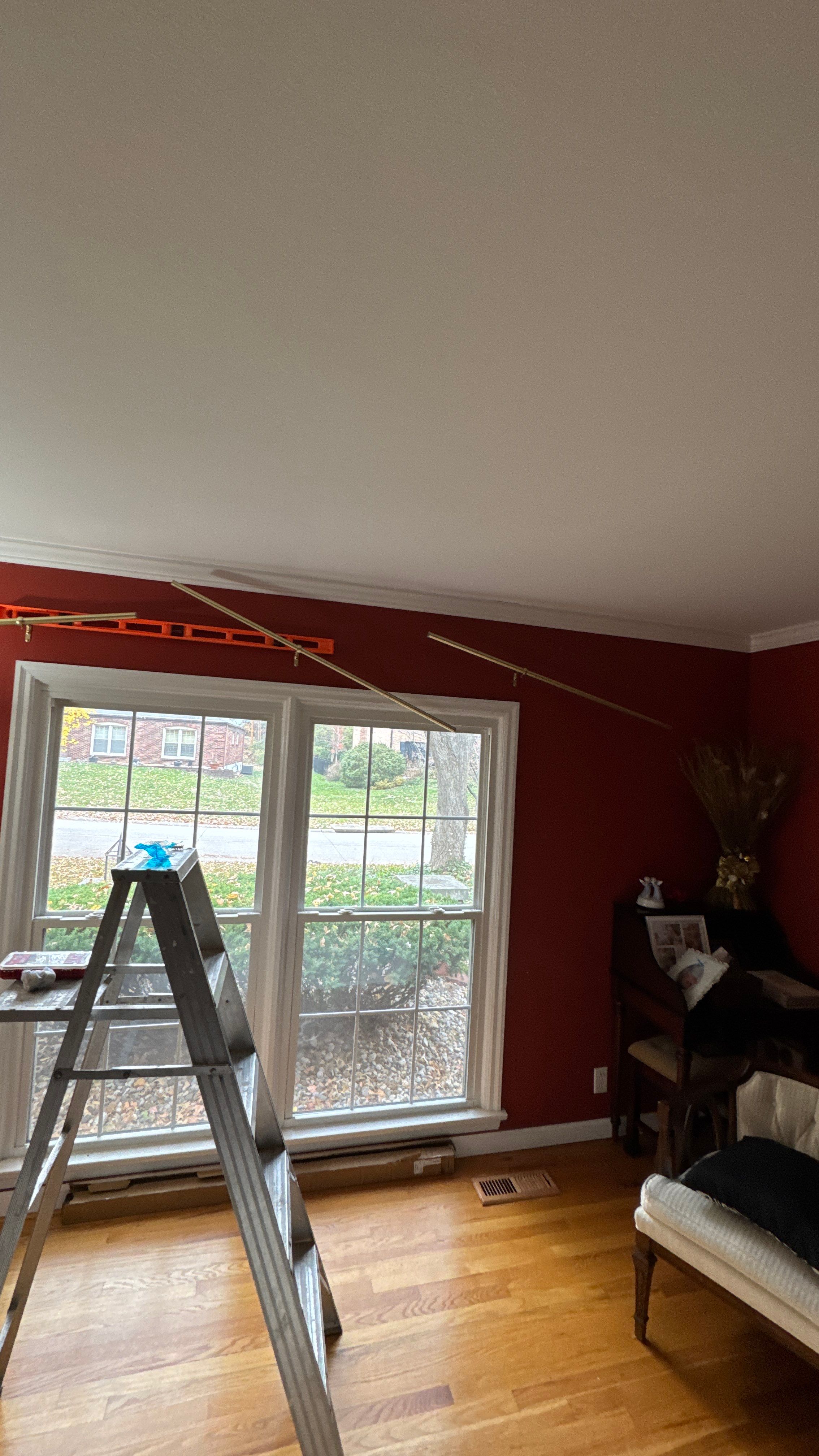 Handyman Project - Hanging Curtain Rods by Legendary Services Company LLC.