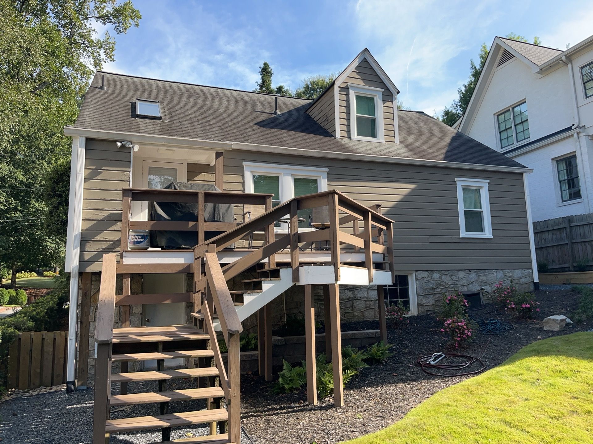 Full Siding Replacement, Deck Build, Exterior Paint, and Gutter Replacement  by Nelson Exteriors 