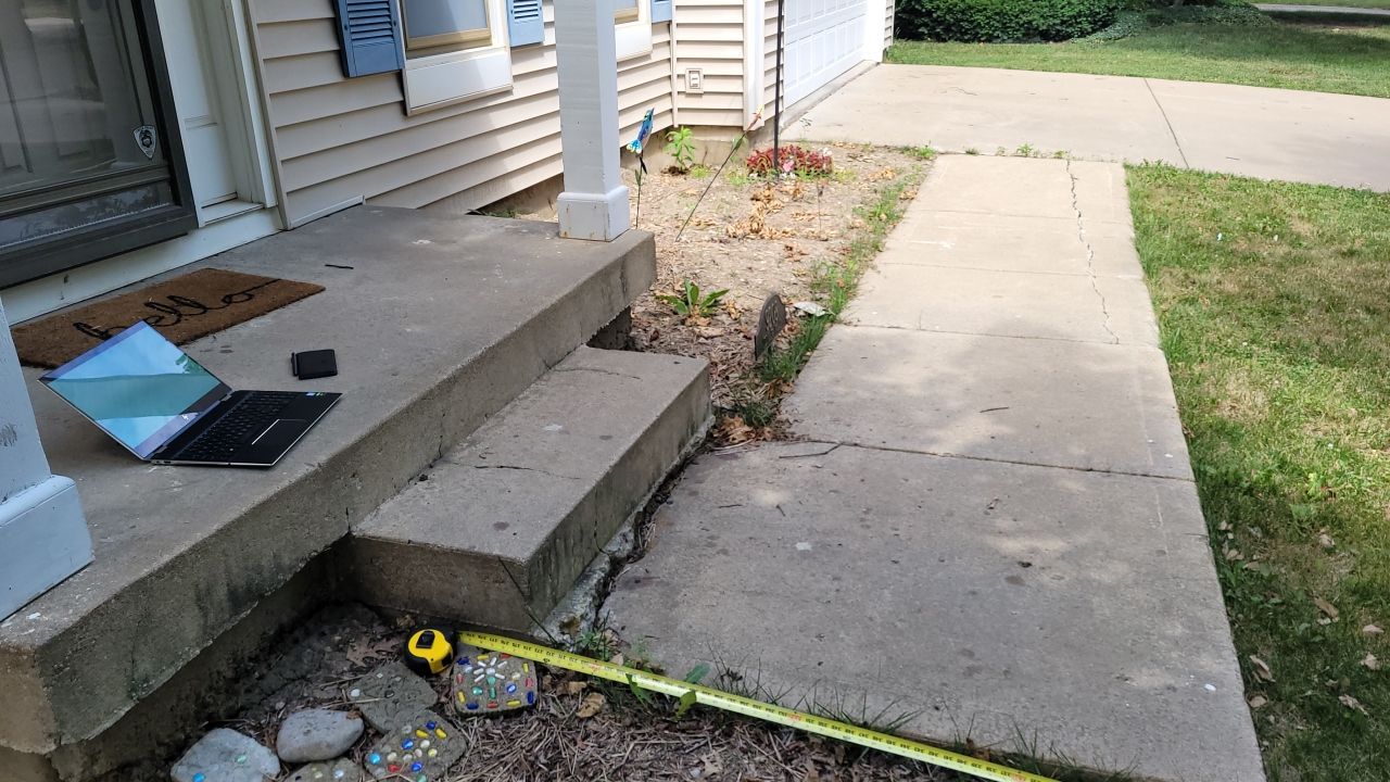 Front Yard Landscape and Retaining Wall by LAND ESCAPES LLC