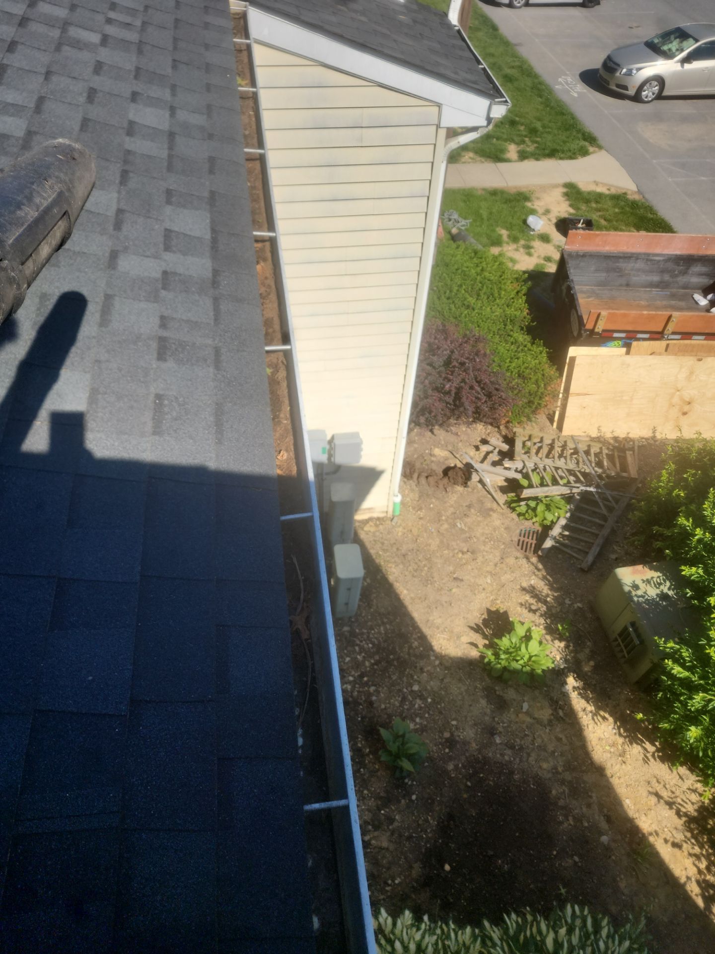 Commercial gutter cleaning Lancaster, PA before photo with filled gutters