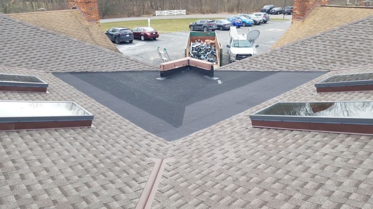 Skylight removal and install  by Absolute Roofing and Construction
