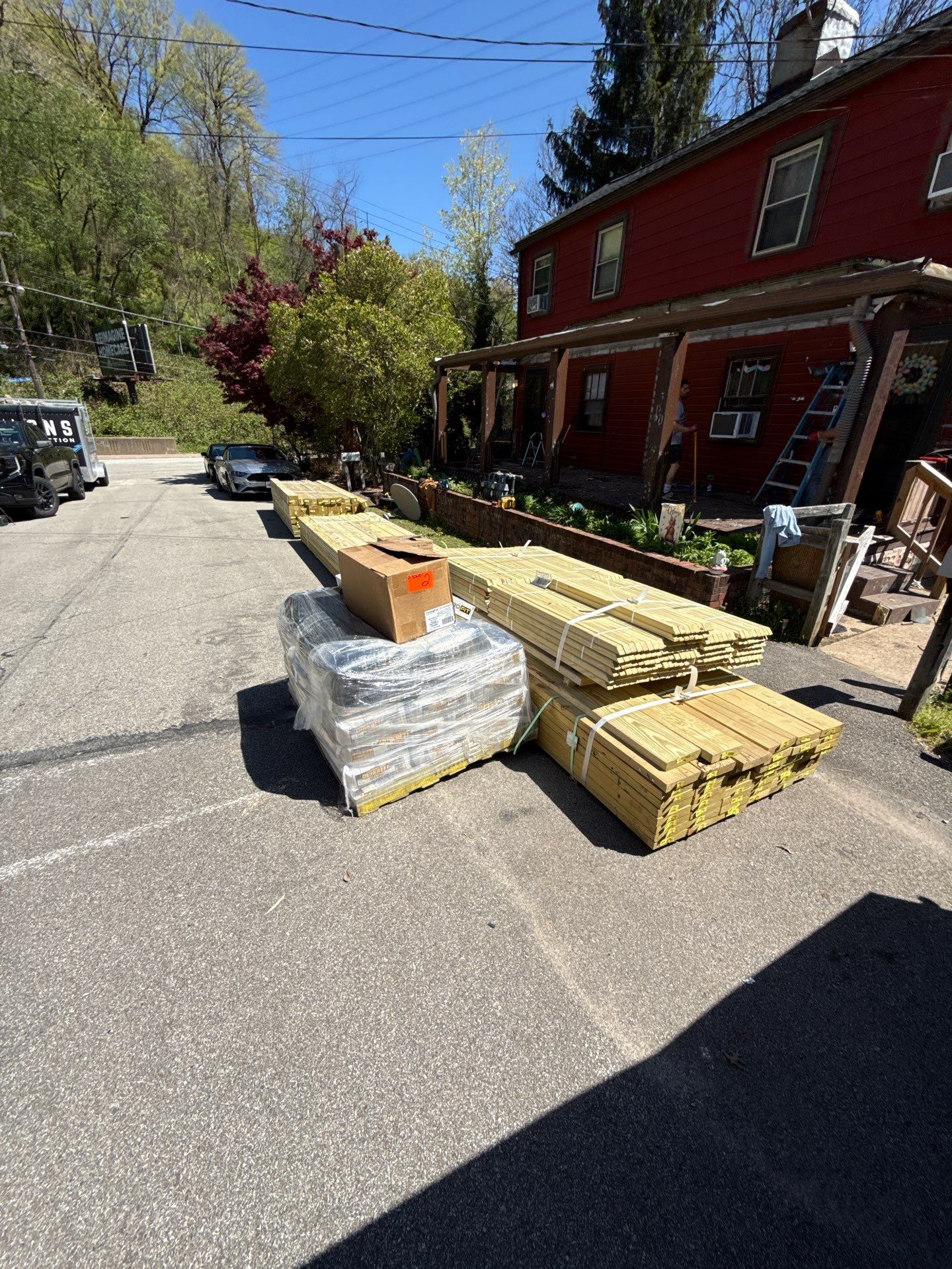 Roof sunspace deck  by Cousins Roofing Siding & Decks