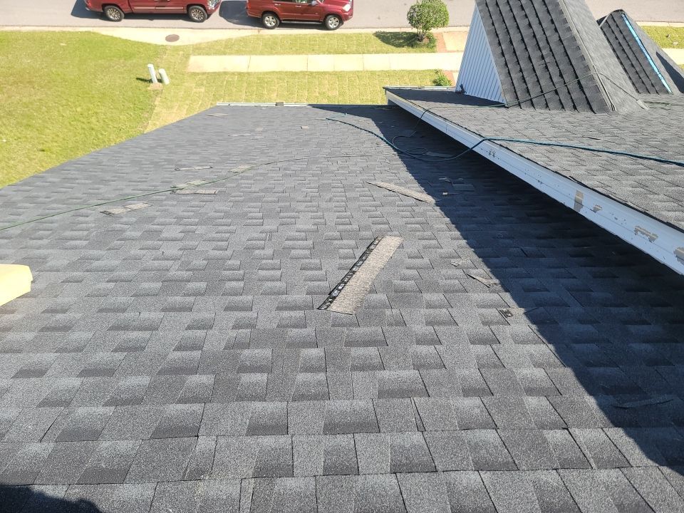 Residential Roofing Installation using Roof Replacement by American Roofing & Construction LLC