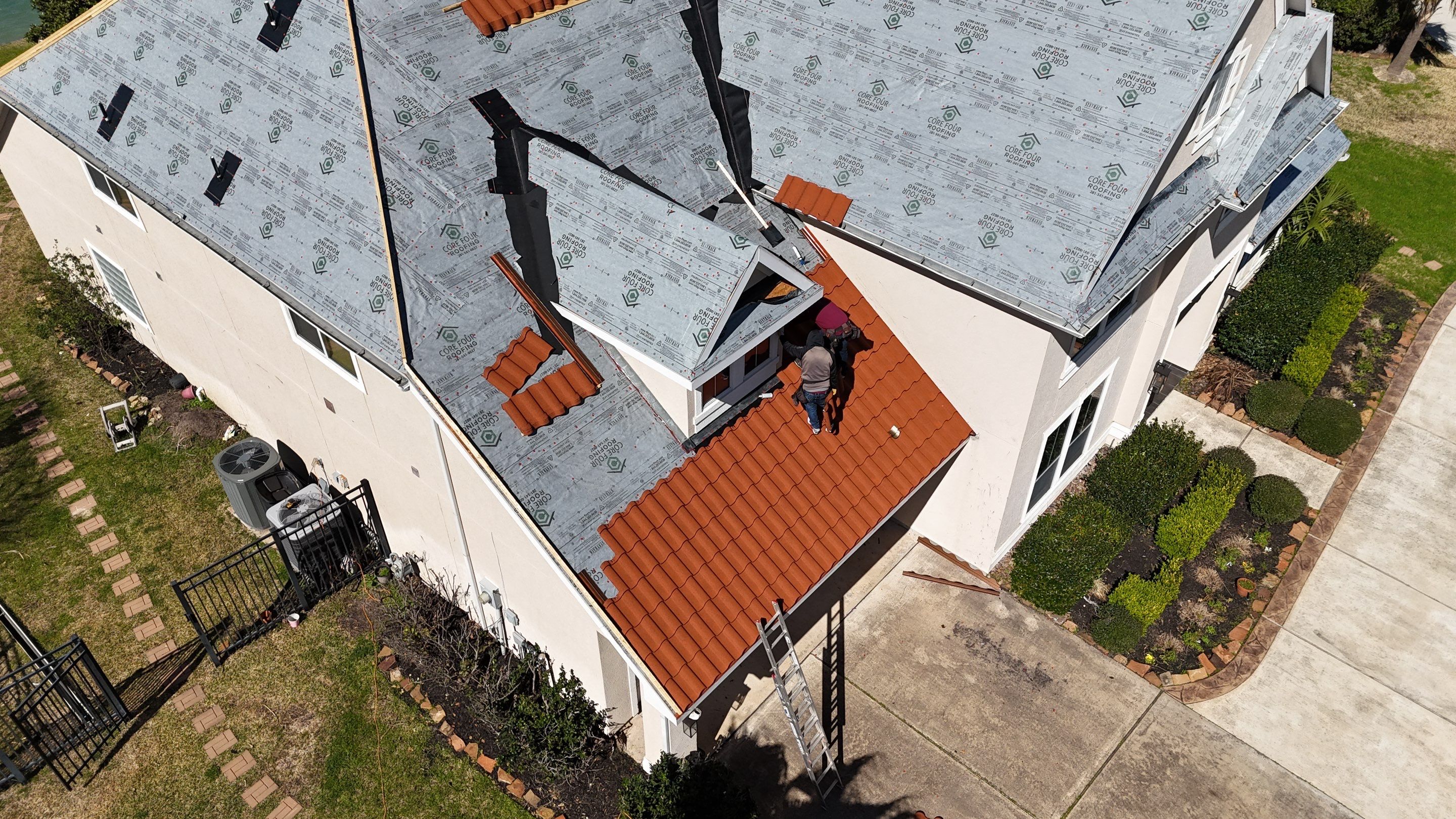 Stunning transformation using DECRA Villa Tile!  by Core Four Roofing