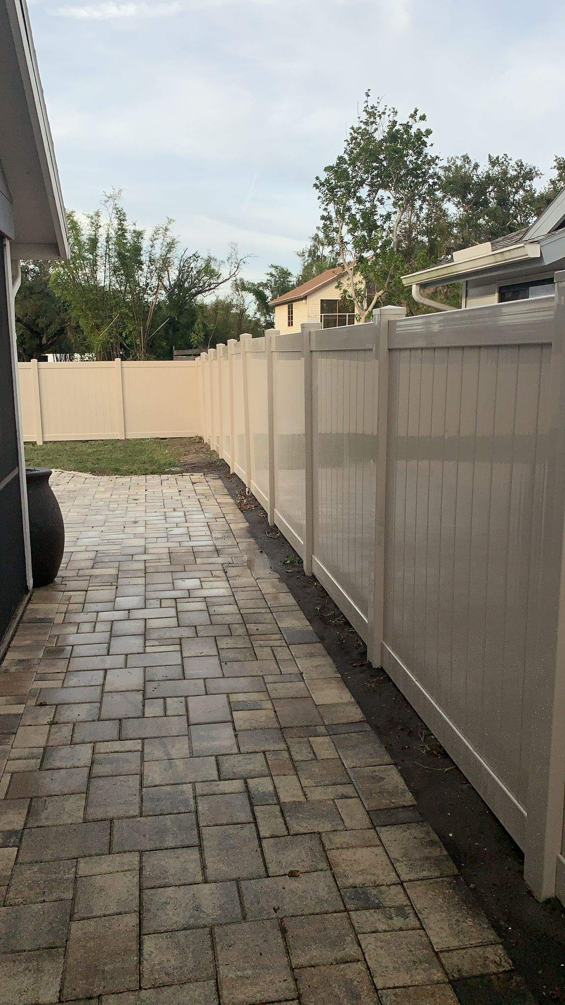 Vinyl Privacy Fence and Custom Paver Patio Installation in Lehigh Acres by True Fence LLC