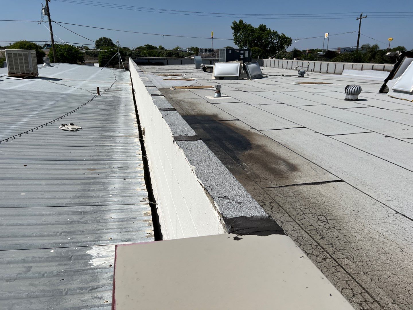 Spray foam and coatings using Conklin Benchmark/PUMA XL coatings and spray foam by Straight Edge Roofing Inc