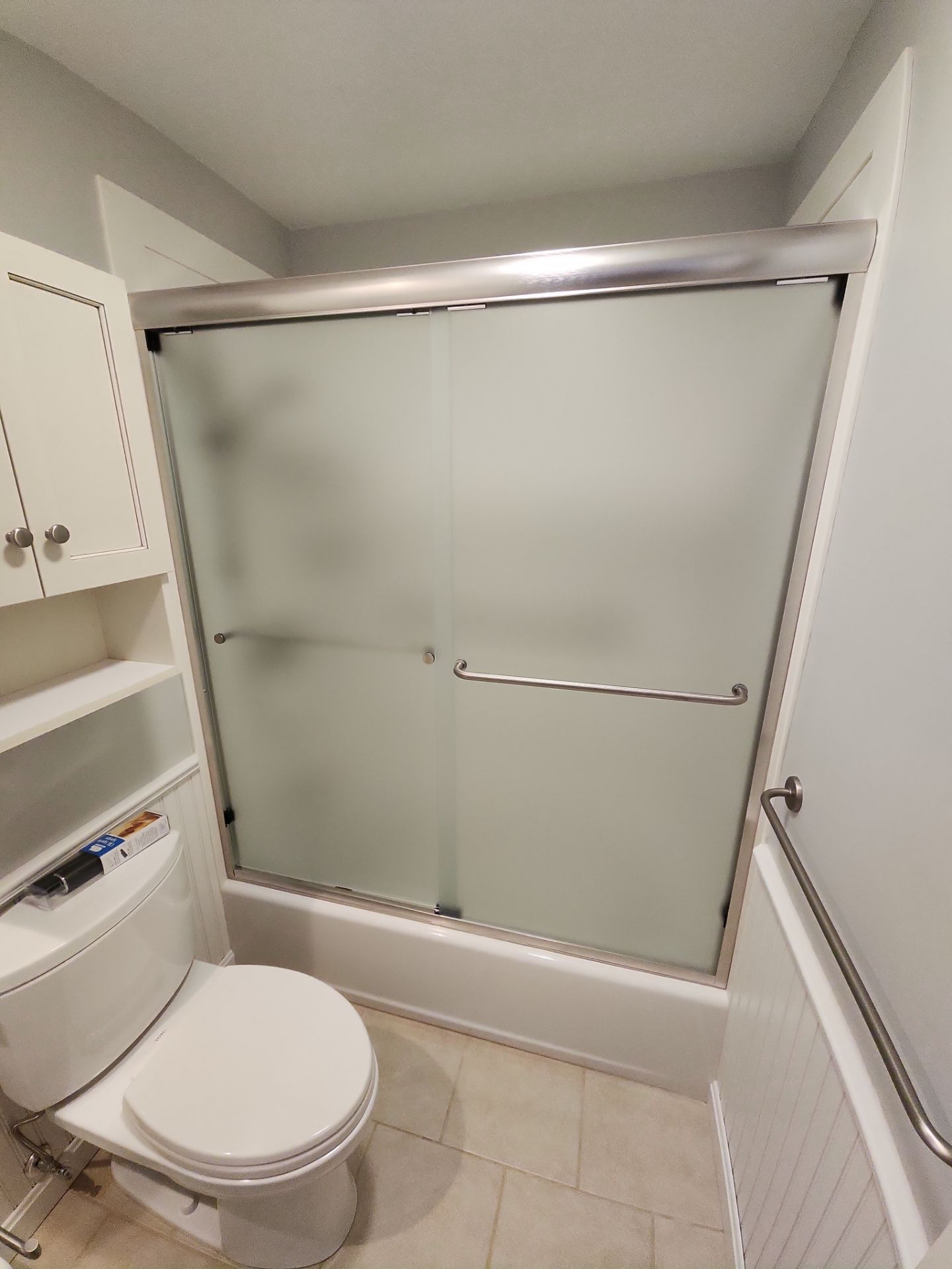 Semi-Frameless Sliding Shower Doors on Tub Base by Cheshire Glass Company