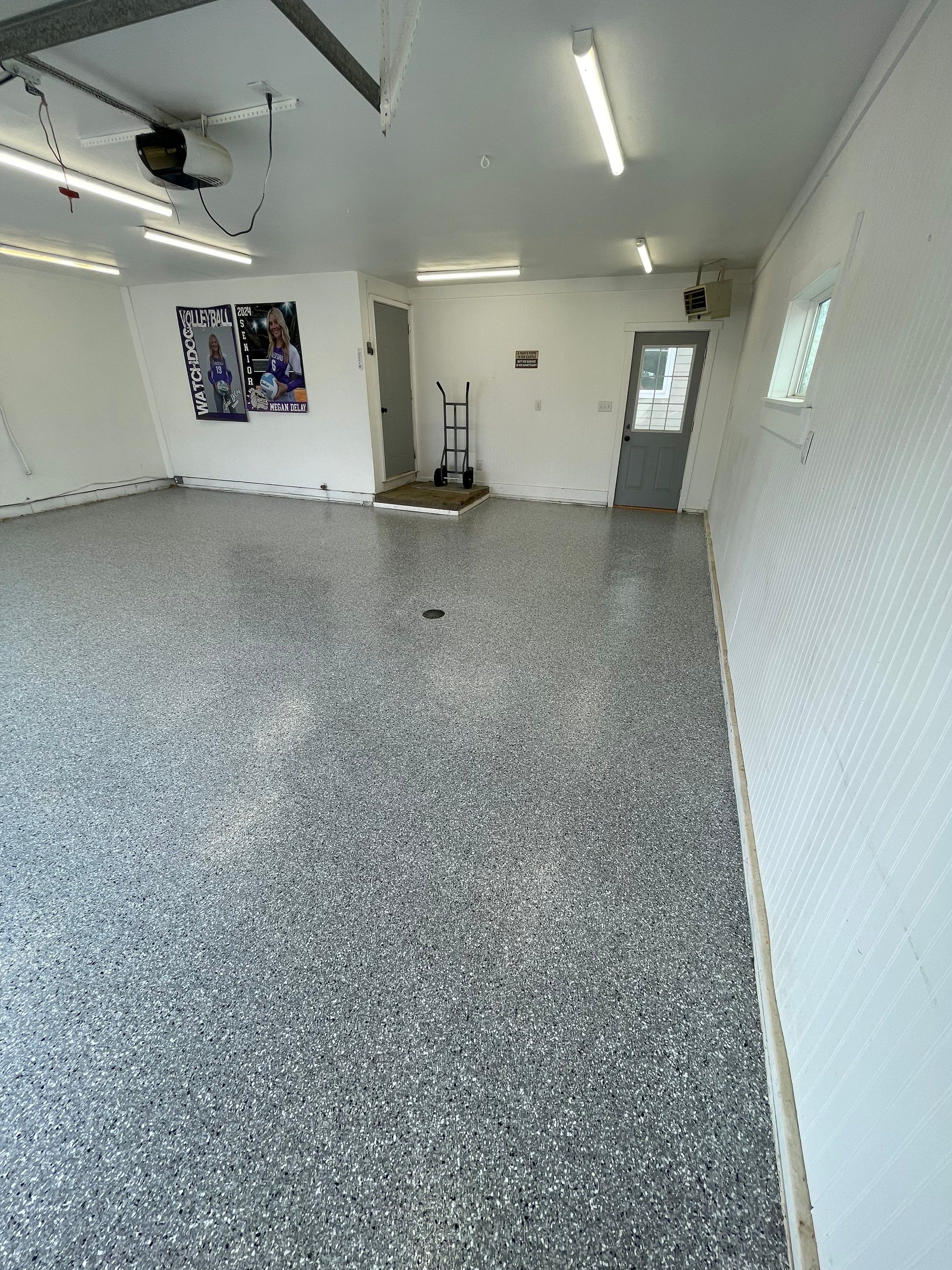 Feather Grey Garage Floor Coating and Crack Repair in Beresford by Select Painting, Coatings & Garage Cabinets