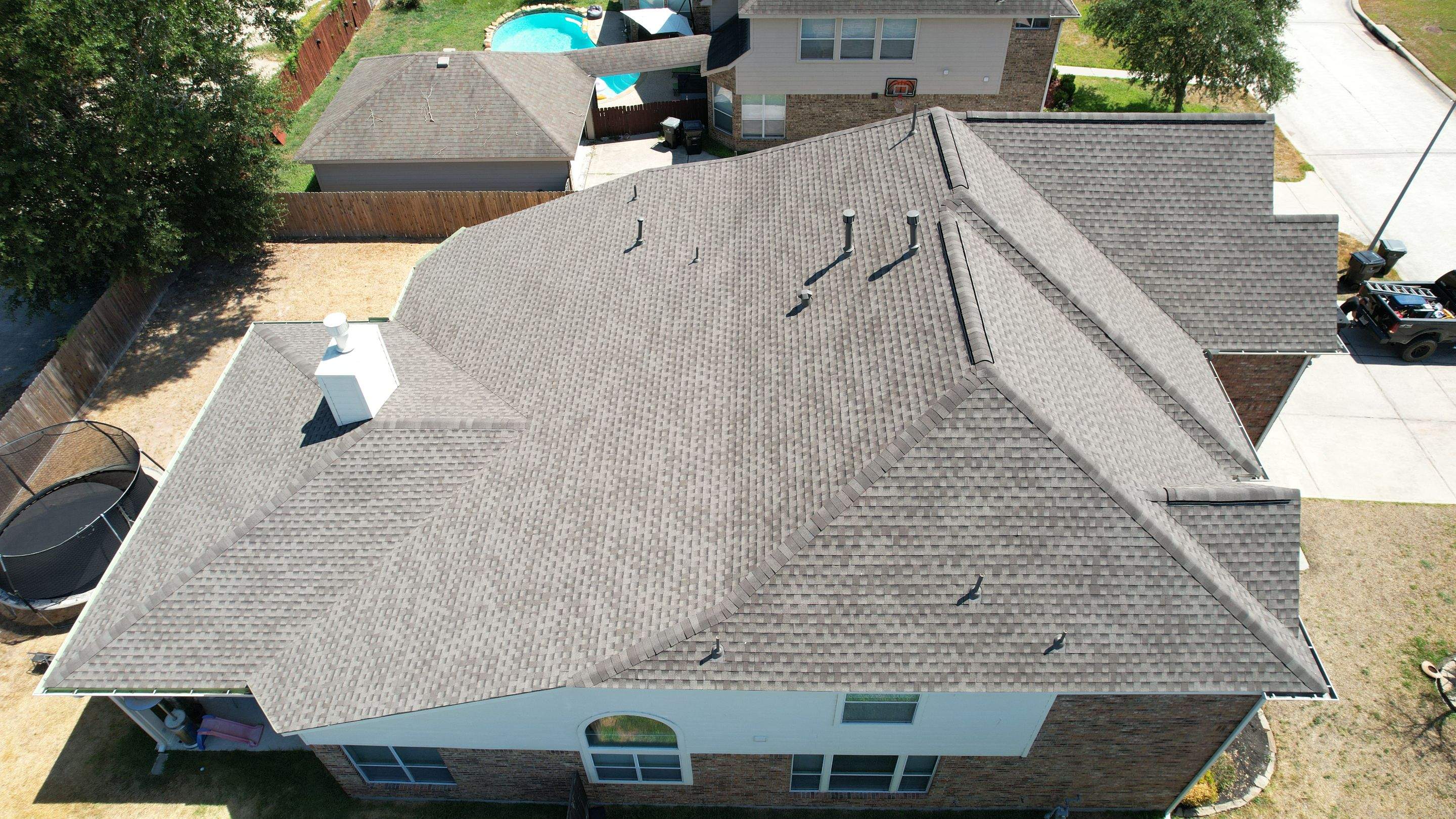 Brick Two-Story Roof Replacement, Tear-Off to Finish — Spring, TX by PL Roofing & SB Roofing, LLC.