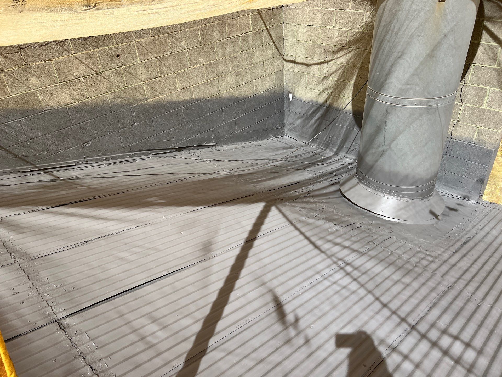 Spray foam and coatings using Conklin Benchmark/ PUMA XL acrylic coatings over metal and foam by Straight Edge Roofing Inc