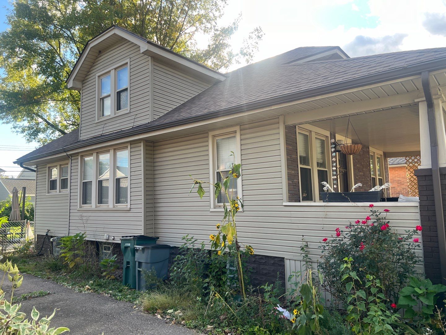 Vinyl Siding Replacement by Bloomfield Construction & Restoration