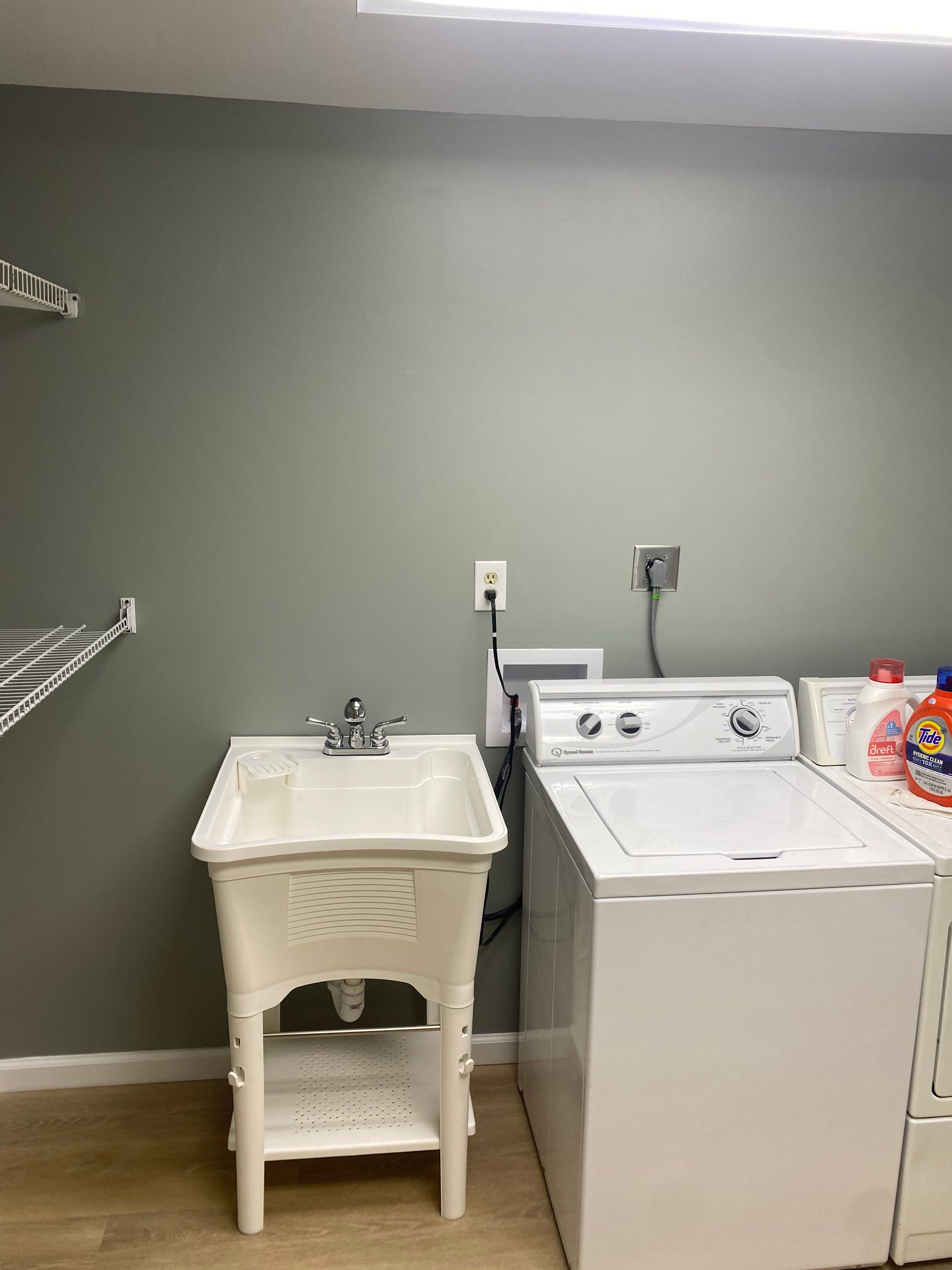 Laundry Room Redmodel using Lifeproof Luxury Vinyl Plank Flooring by The Smet Companies, LLC