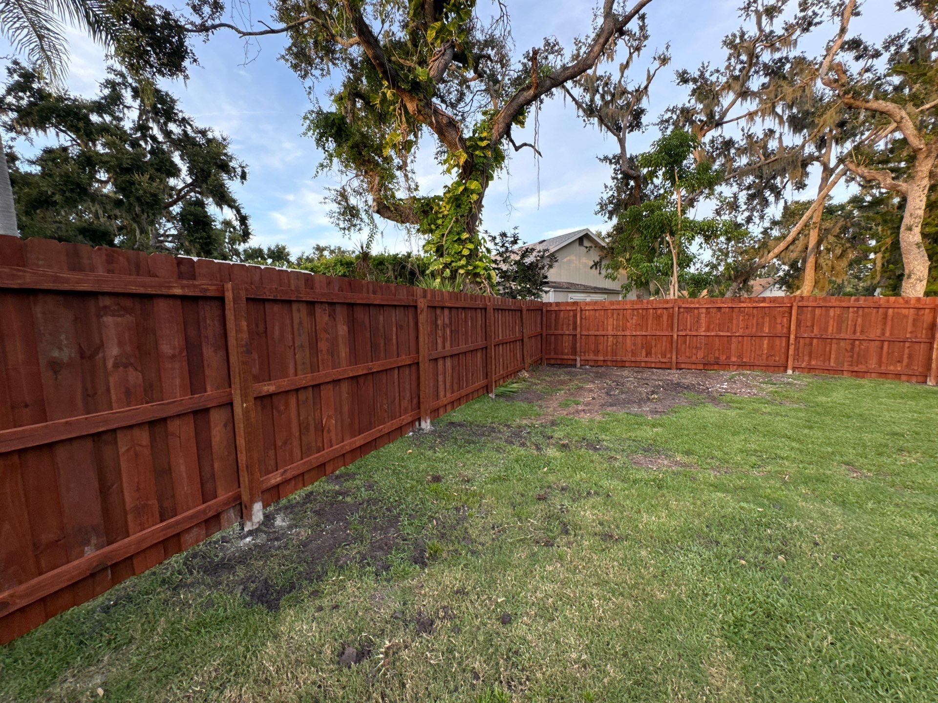 Wood Fence Installation using Pre-stained Pine Board On Board by Asap fence and gates, LLC