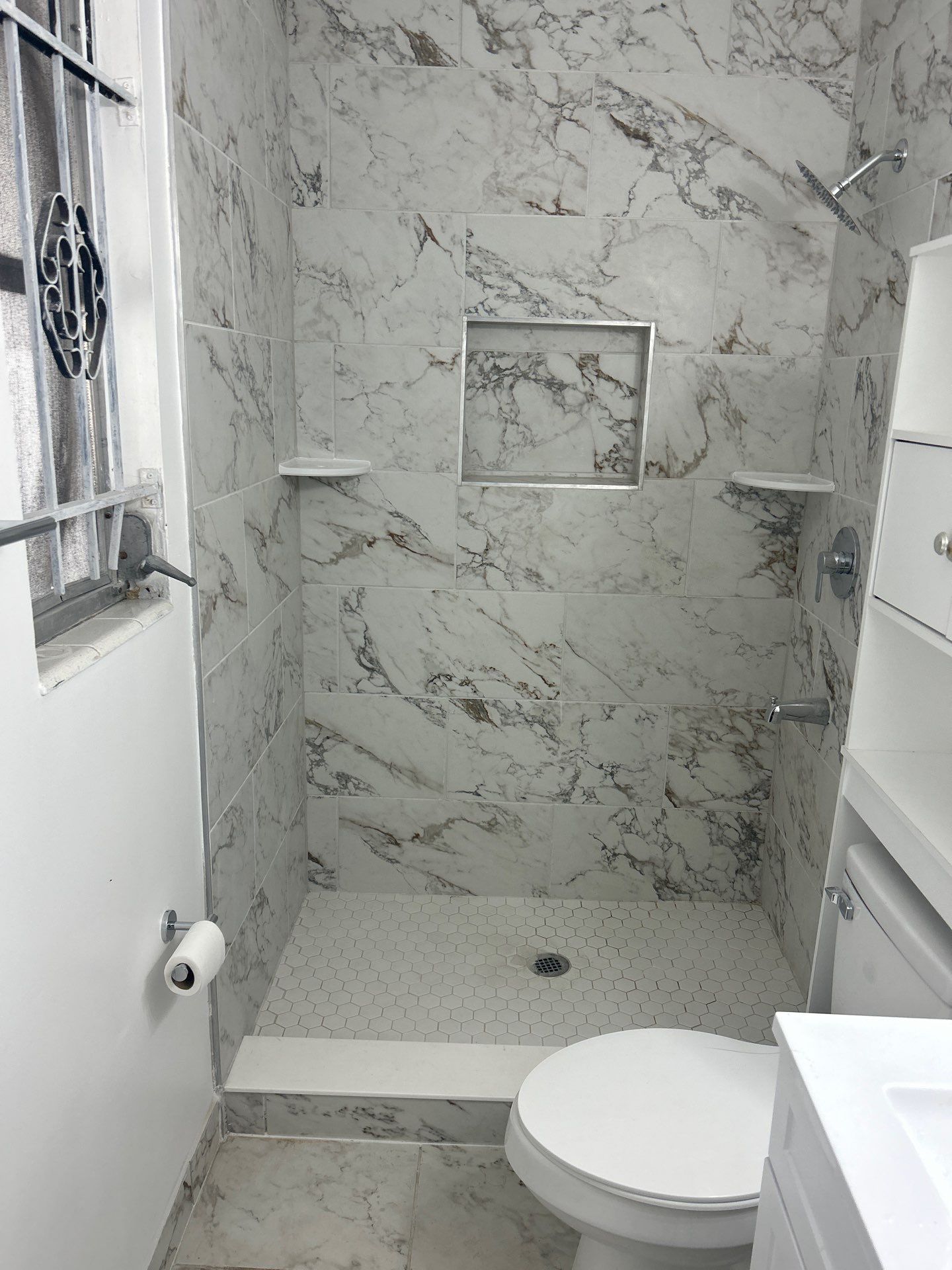 Dual Bathroom Makeover by urban green energy llc
