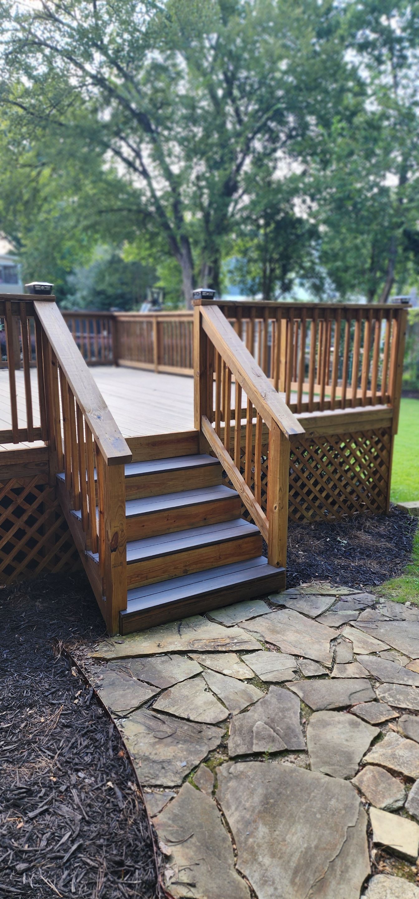 Deck Staining using Walnut by SSE by Titans of Timber Fence & Stain