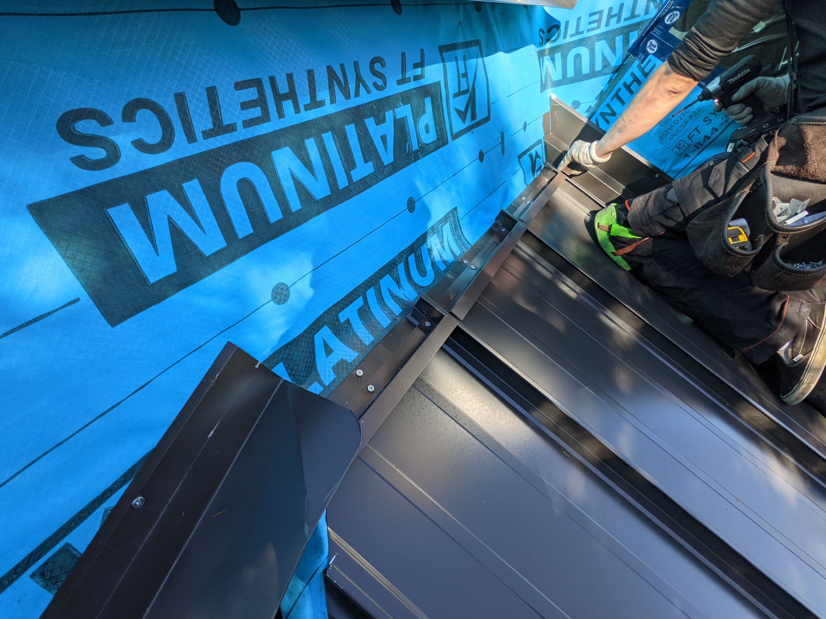 Residential Roofing Installation using 16" Standing Seam Panels by Jay Carter Roofing & Sheet Metal